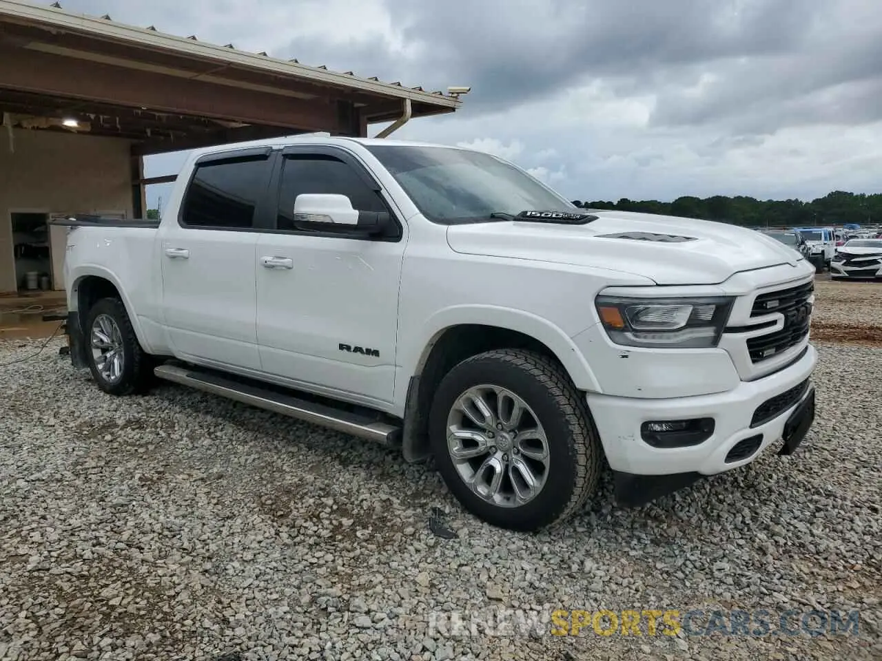 4 Photograph of a damaged car 1C6SRFJT9NN434509 RAM 1500 2022