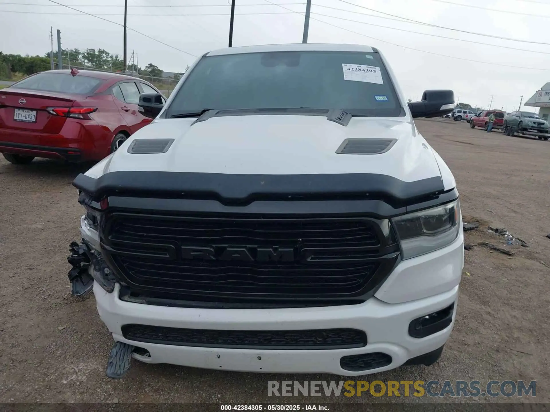 13 Photograph of a damaged car 1C6SRFJTXNN129844 RAM 1500 2022