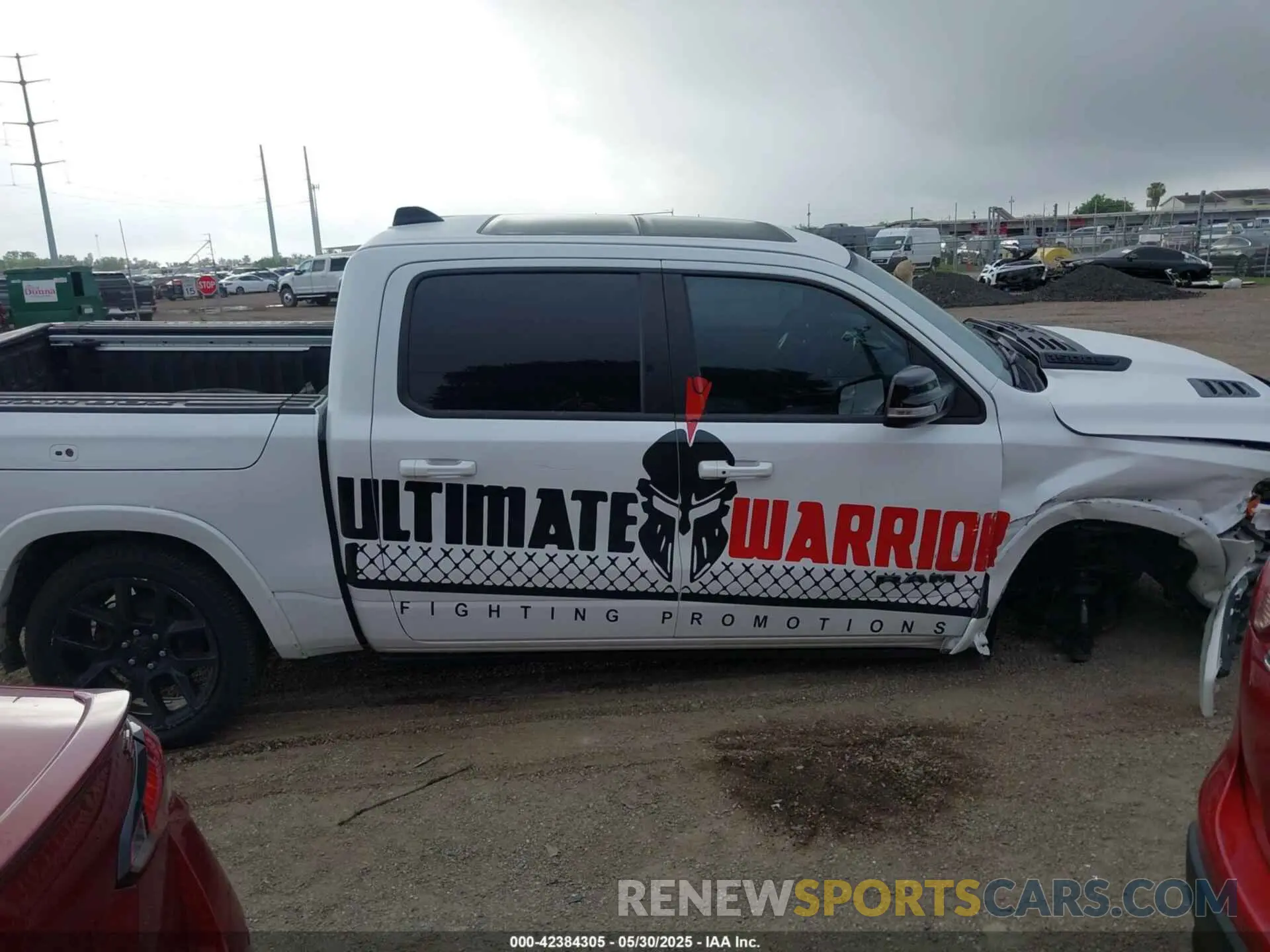 14 Photograph of a damaged car 1C6SRFJTXNN129844 RAM 1500 2022