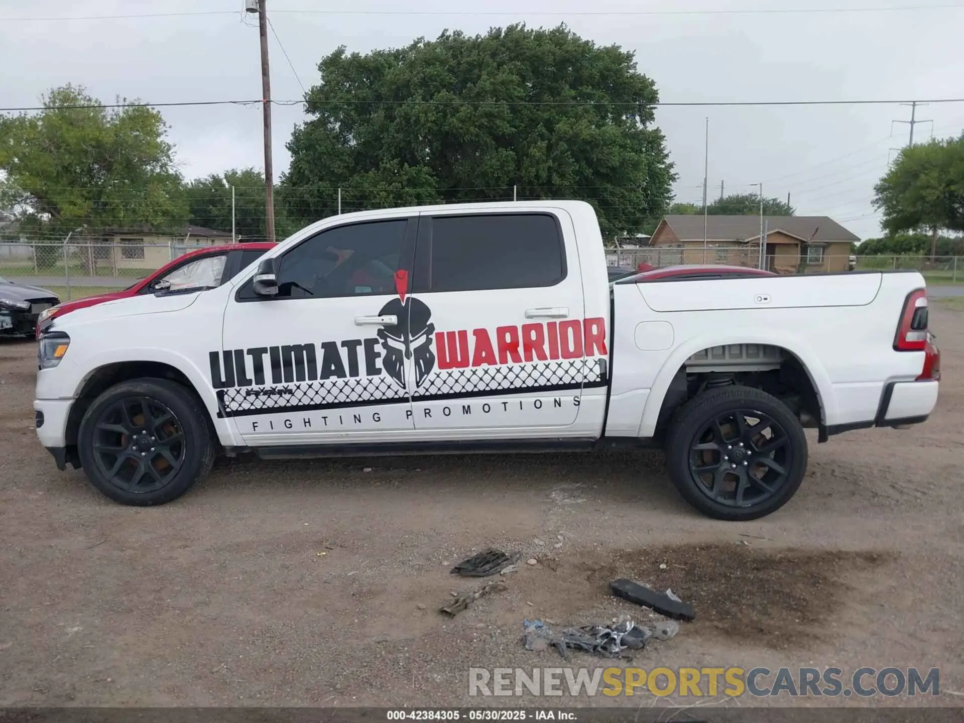 15 Photograph of a damaged car 1C6SRFJTXNN129844 RAM 1500 2022