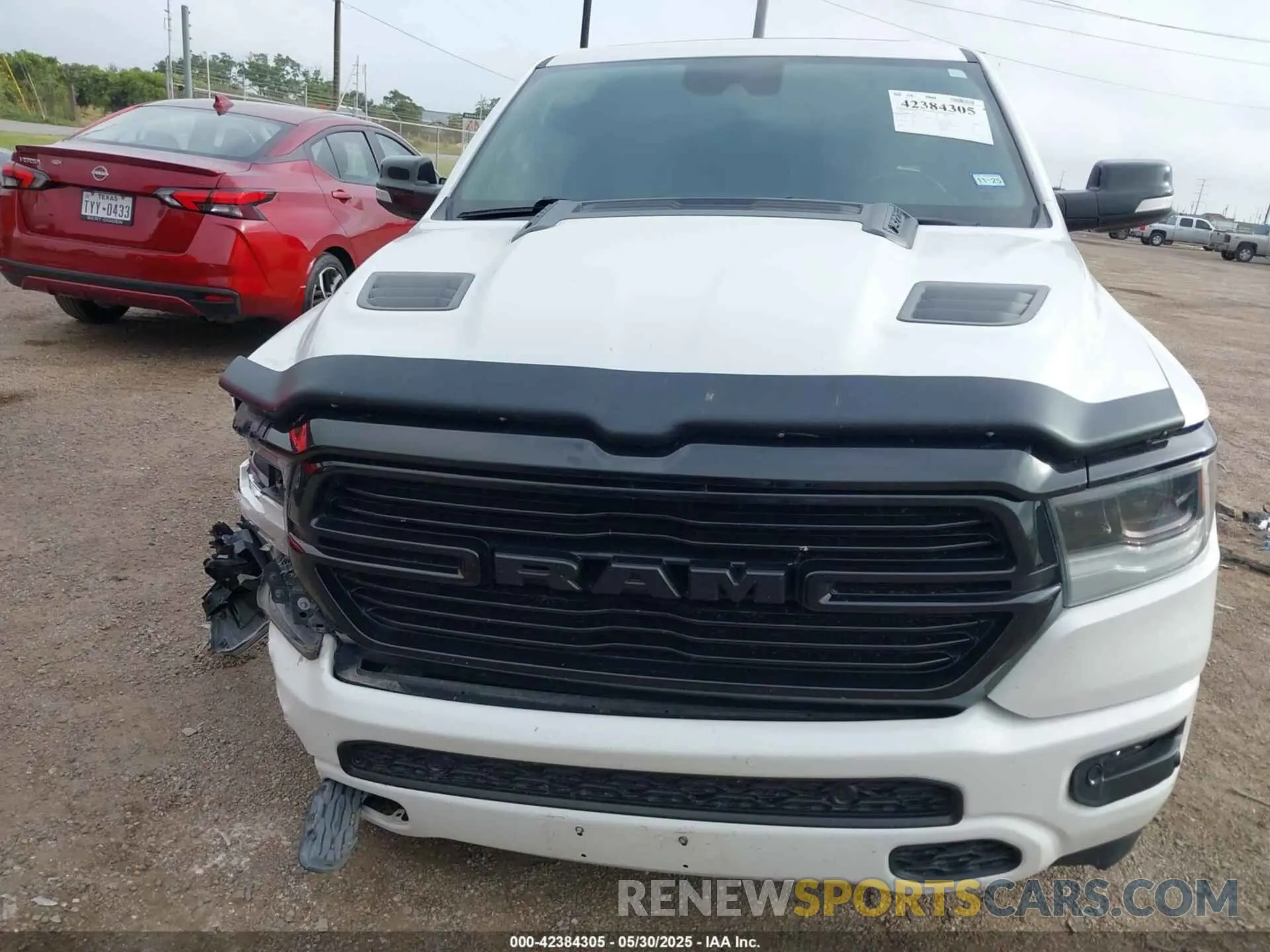 6 Photograph of a damaged car 1C6SRFJTXNN129844 RAM 1500 2022