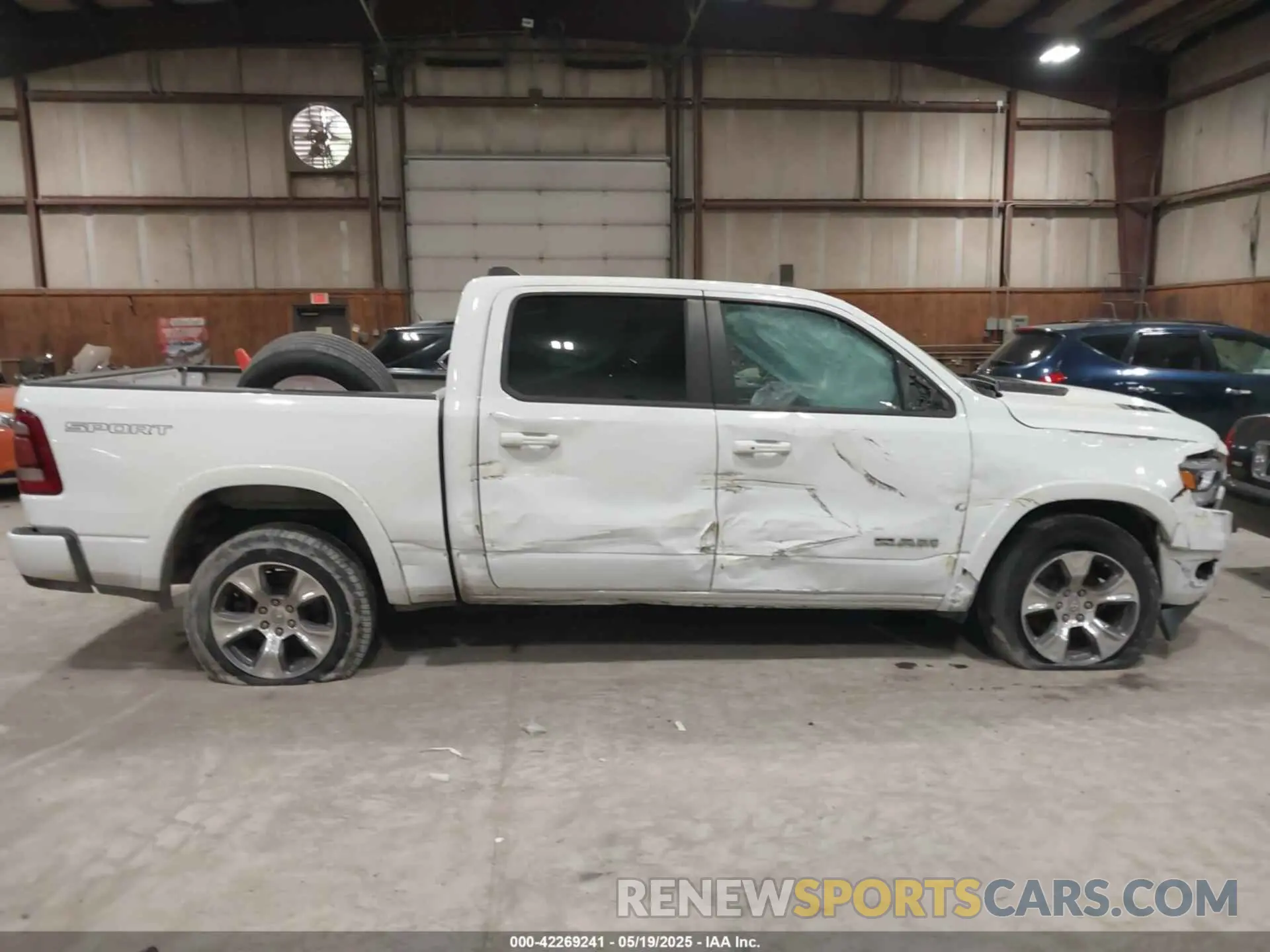 14 Photograph of a damaged car 1C6SRFJTXNN222654 RAM 1500 2022