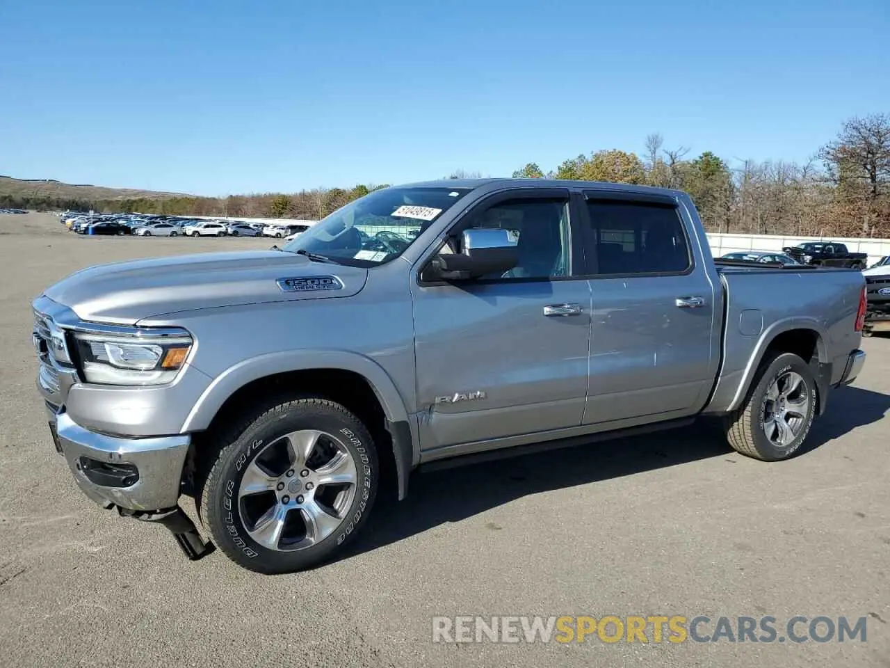 1 Photograph of a damaged car 1C6SRFJTXNN246260 RAM 1500 2022