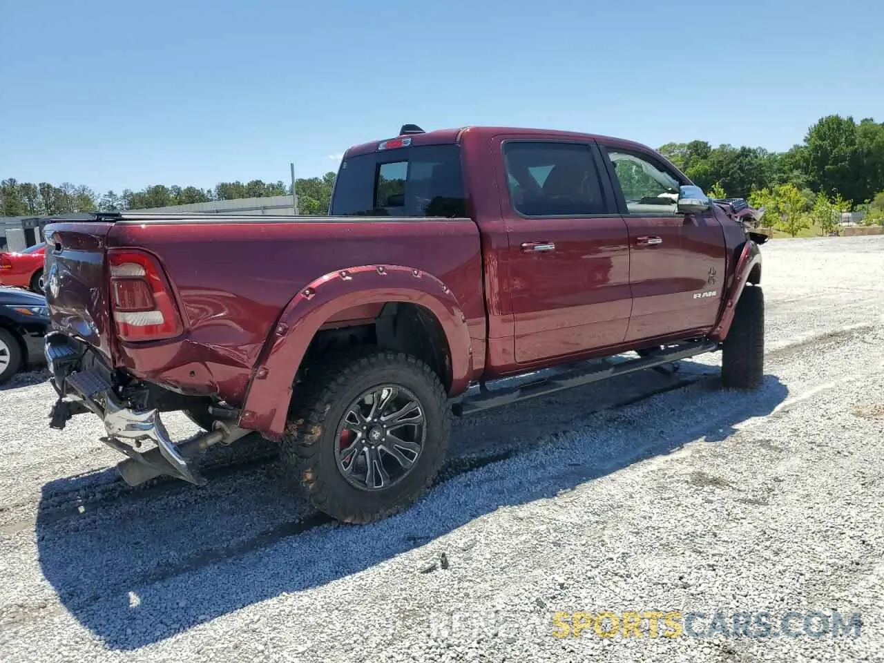 3 Photograph of a damaged car 1C6SRFJTXNN310572 RAM 1500 2022