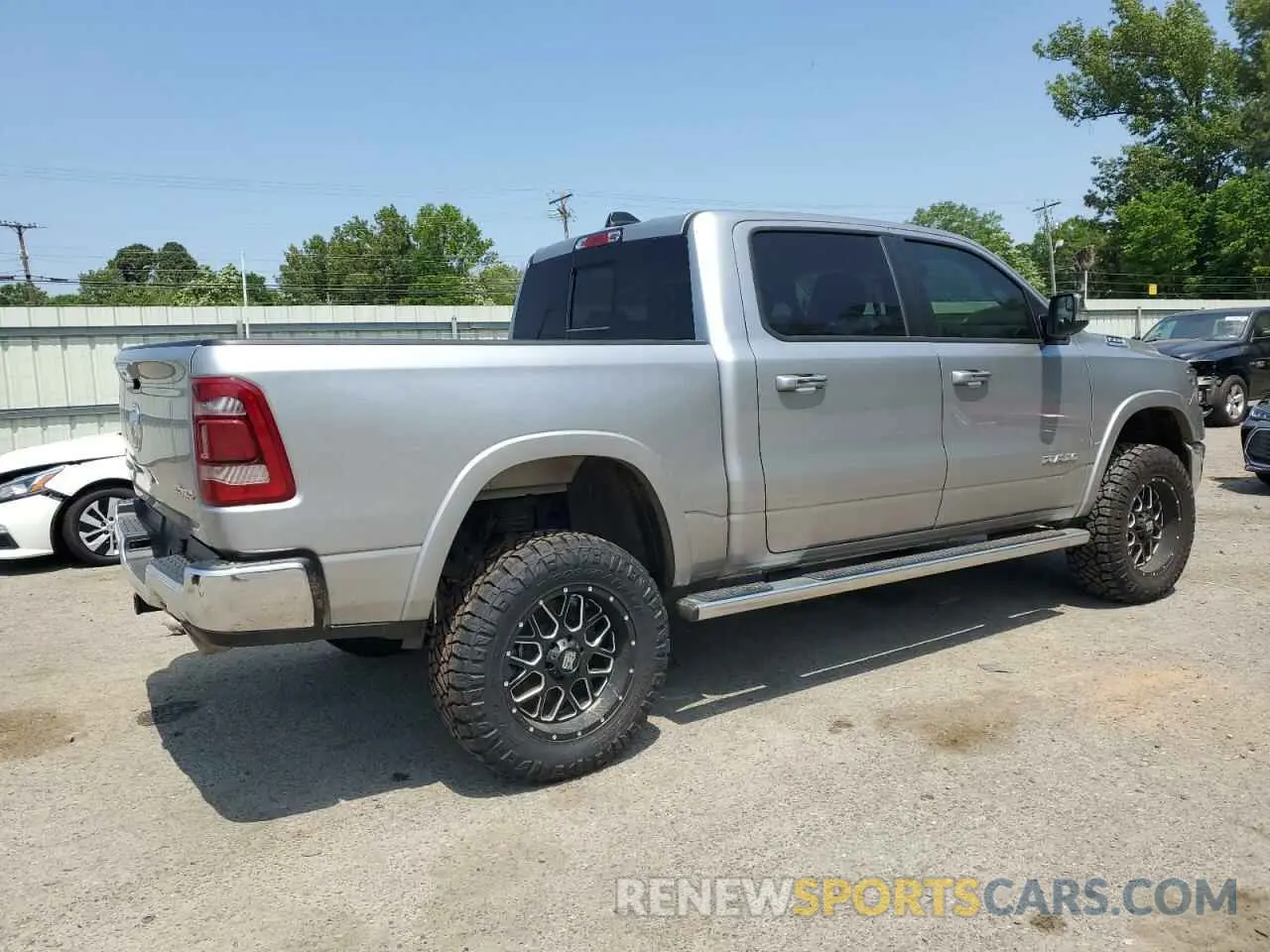 3 Photograph of a damaged car 1C6SRFJTXNN429786 RAM 1500 2022