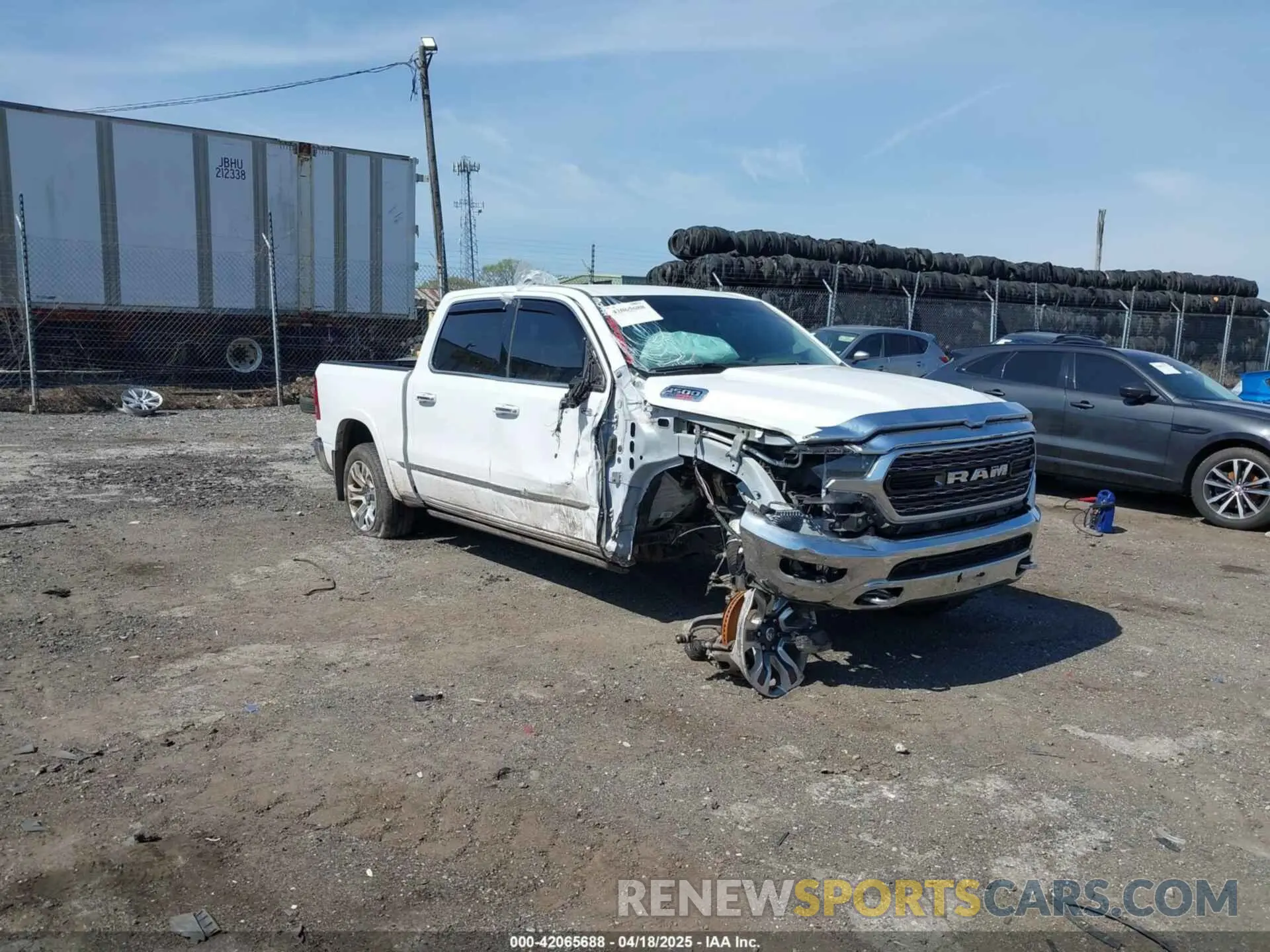 1 Photograph of a damaged car 1C6SRFKM0NN192653 RAM 1500 2022