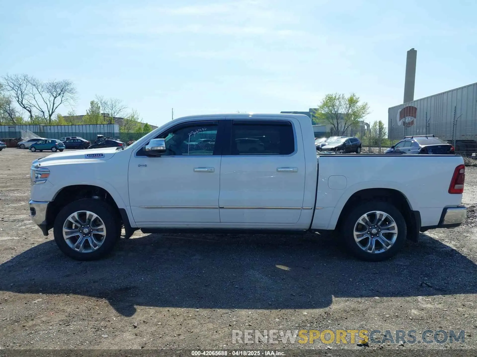 14 Photograph of a damaged car 1C6SRFKM0NN192653 RAM 1500 2022