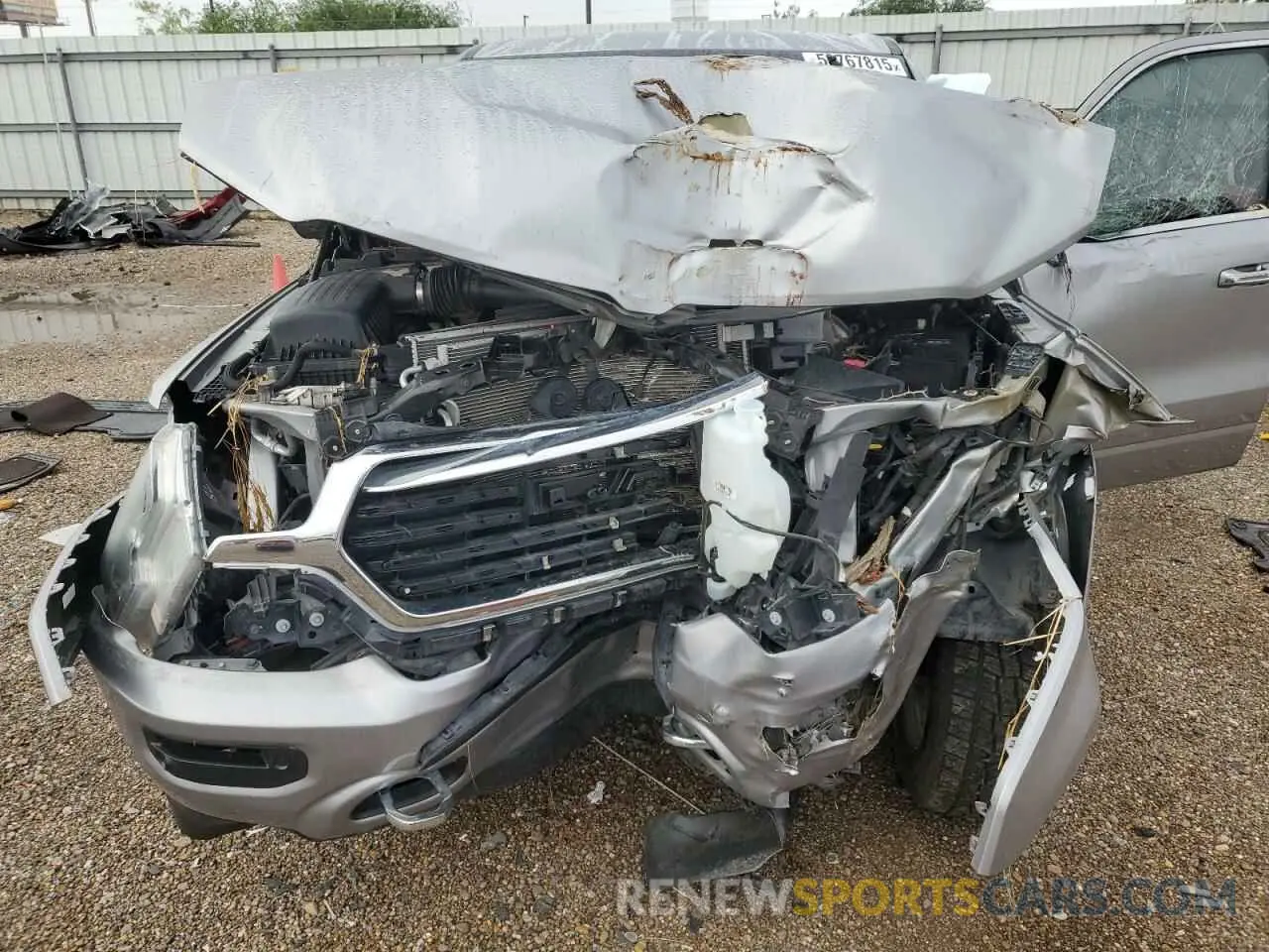 11 Photograph of a damaged car 1C6SRFKM7NN288246 RAM 1500 2022