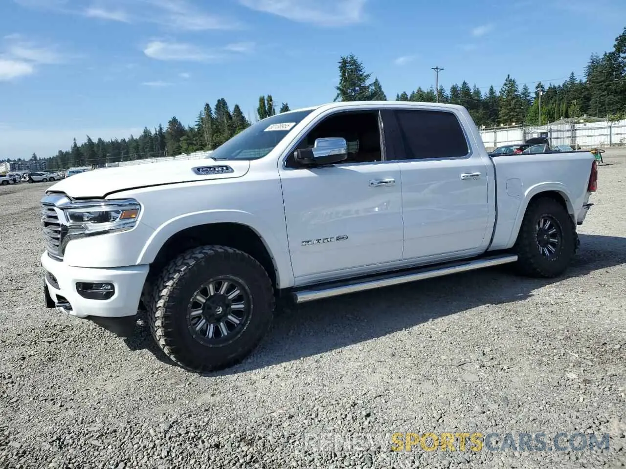 1 Photograph of a damaged car 1C6SRFKT0NN203917 RAM 1500 2022