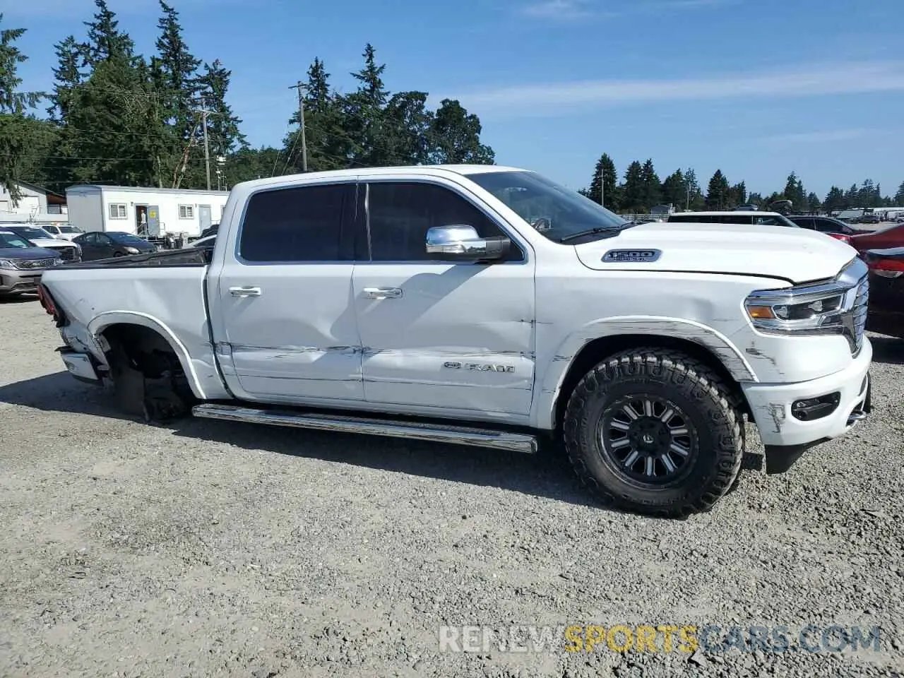 4 Photograph of a damaged car 1C6SRFKT0NN203917 RAM 1500 2022