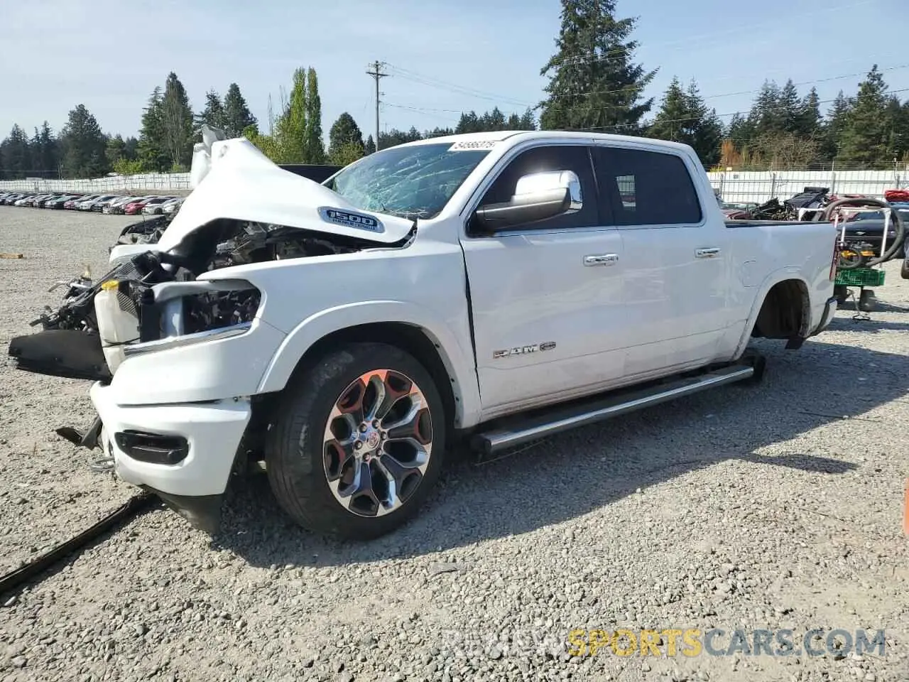1 Photograph of a damaged car 1C6SRFKT6NN130150 RAM 1500 2022