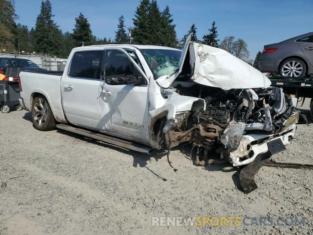 4 Photograph of a damaged car 1C6SRFKT6NN130150 RAM 1500 2022