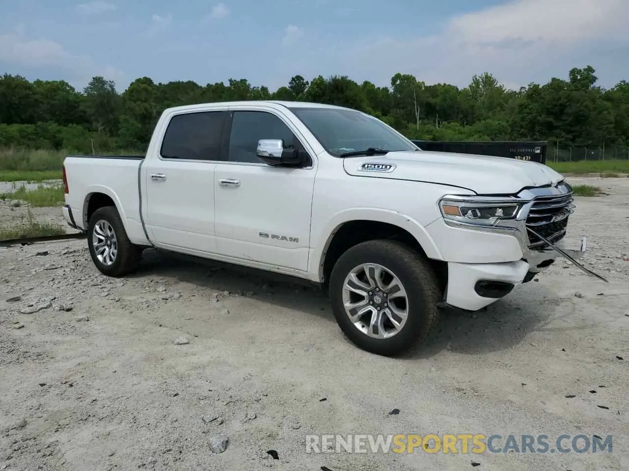 4 Photograph of a damaged car 1C6SRFKTXNN112346 RAM 1500 2022