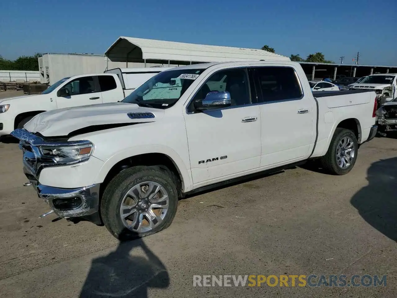 1 Photograph of a damaged car 1C6SRFKTXNN213838 RAM 1500 2022
