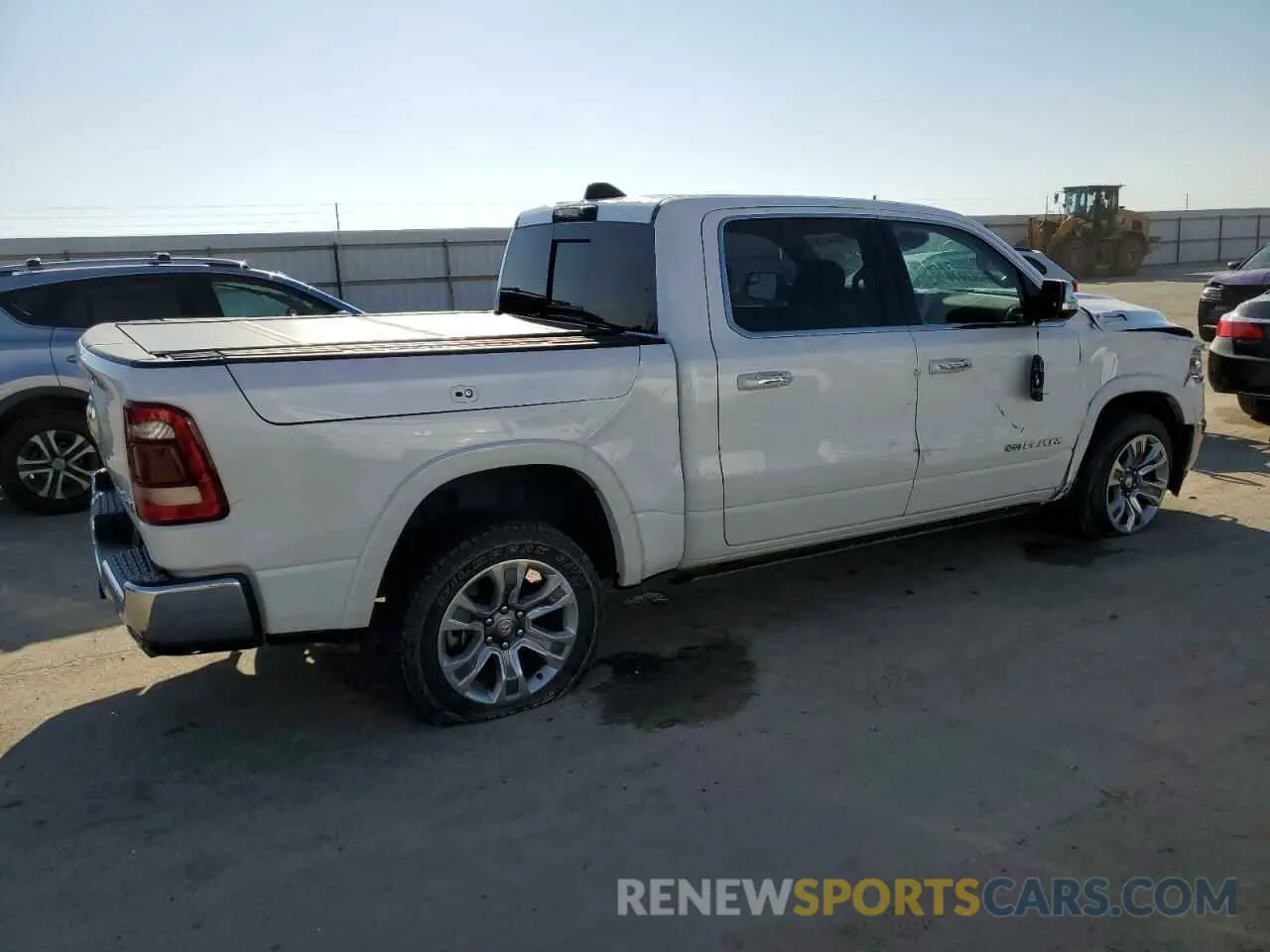 3 Photograph of a damaged car 1C6SRFKTXNN213838 RAM 1500 2022