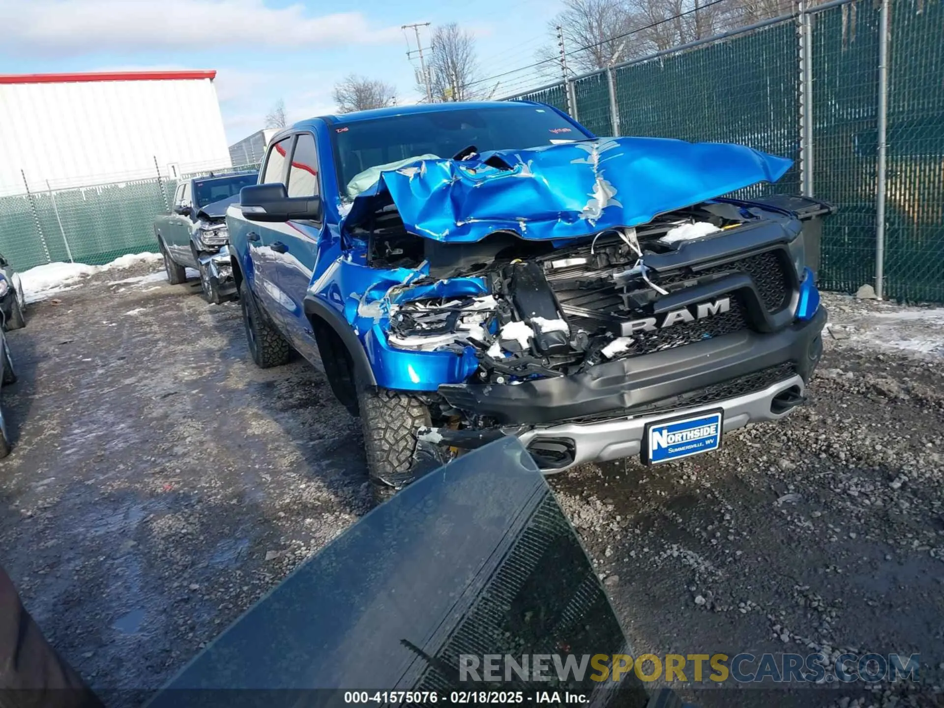 1 Photograph of a damaged car 1C6SRFLT0NN177124 RAM 1500 2022