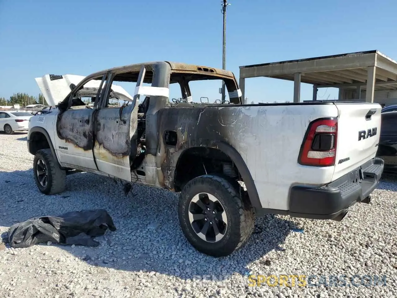 2 Photograph of a damaged car 1C6SRFLT1NN188911 RAM 1500 2022