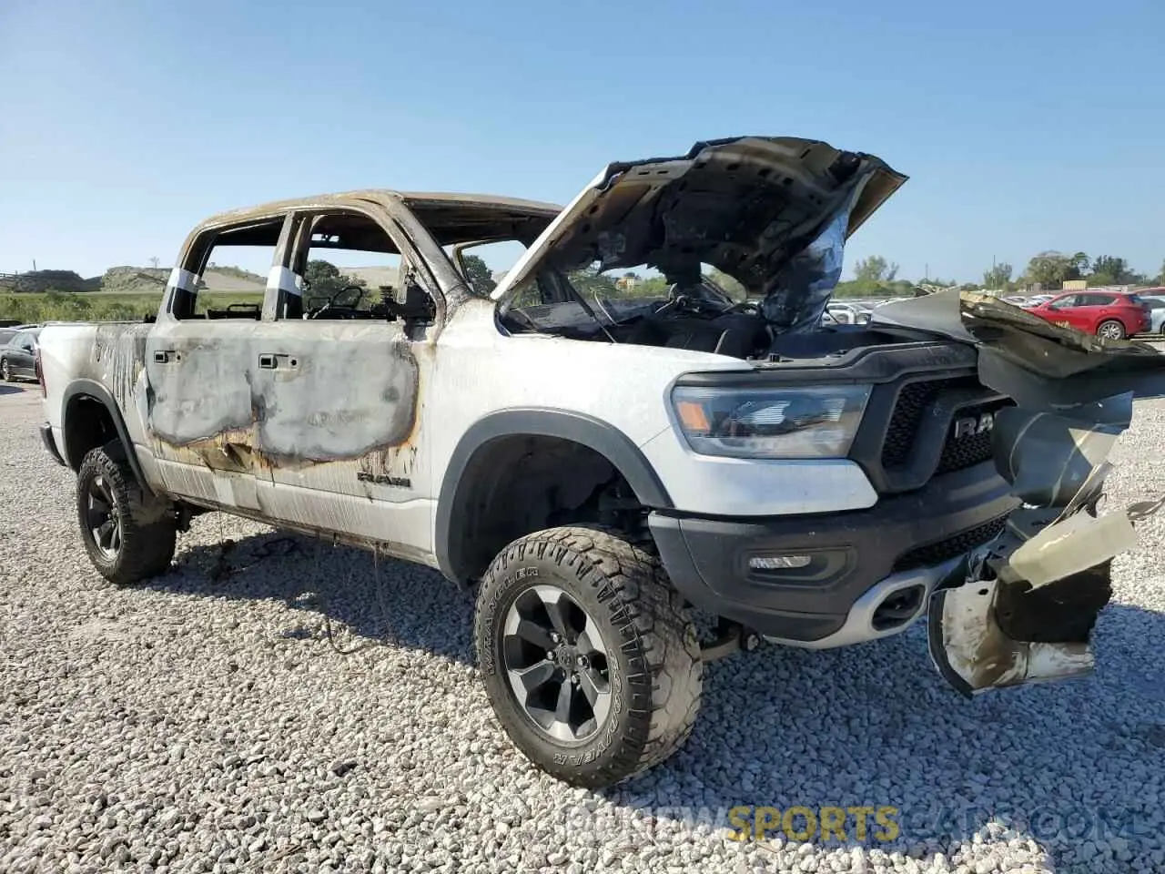 4 Photograph of a damaged car 1C6SRFLT1NN188911 RAM 1500 2022