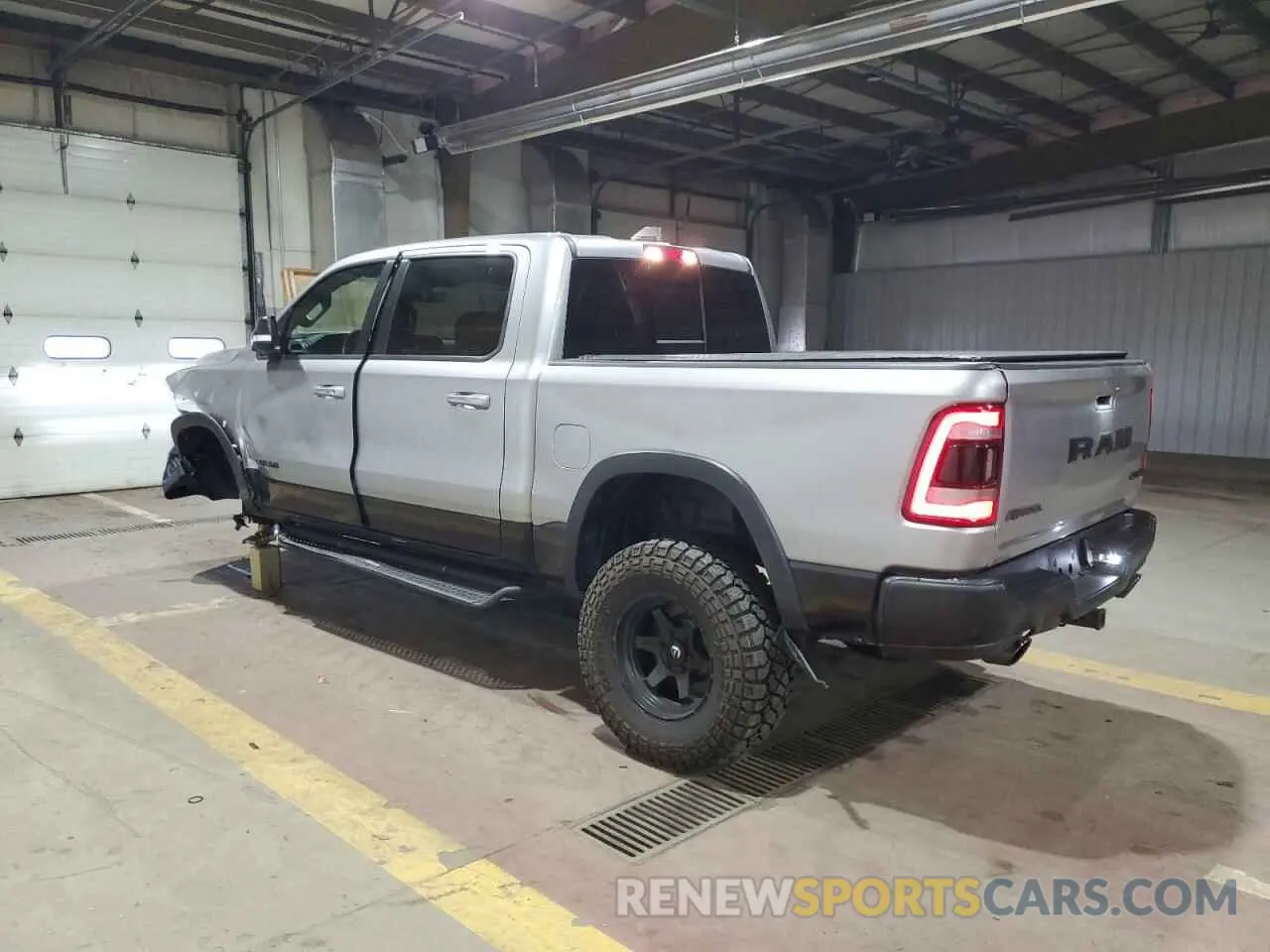 2 Photograph of a damaged car 1C6SRFLT1NN258780 RAM 1500 2022