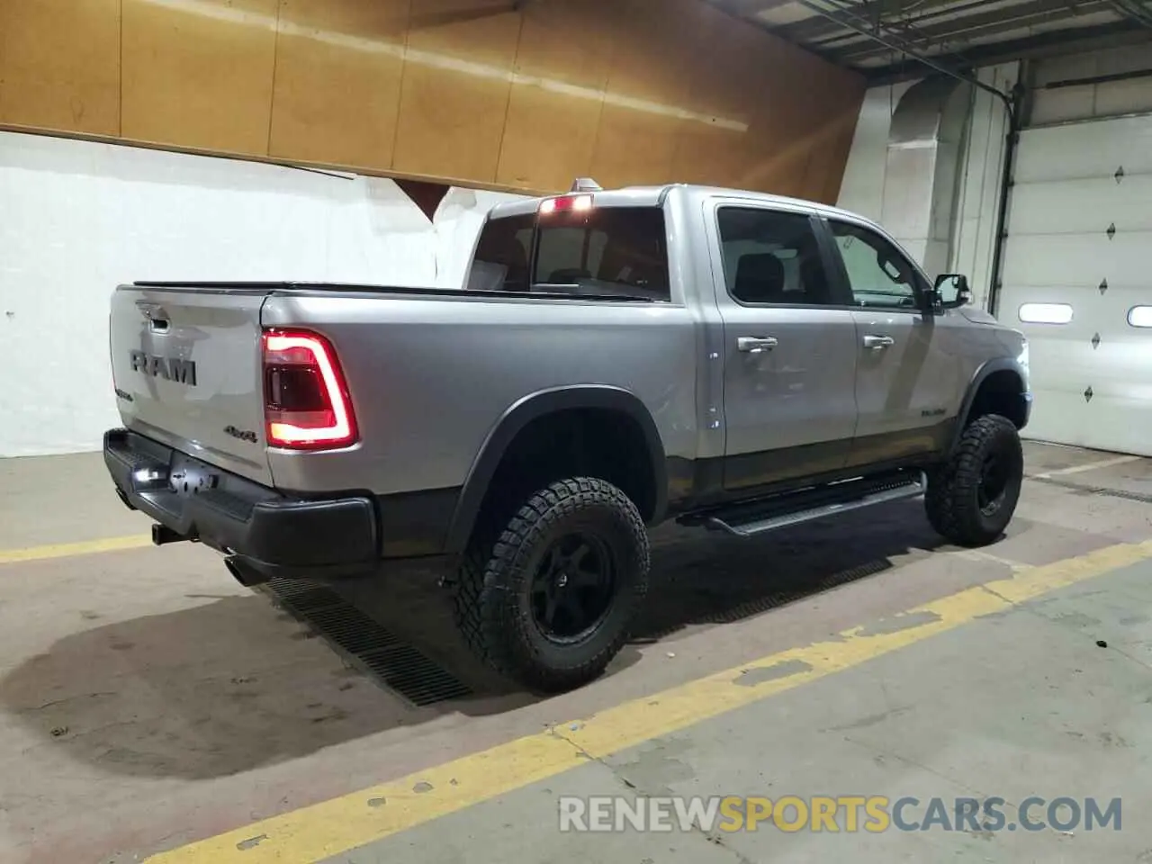 3 Photograph of a damaged car 1C6SRFLT1NN258780 RAM 1500 2022