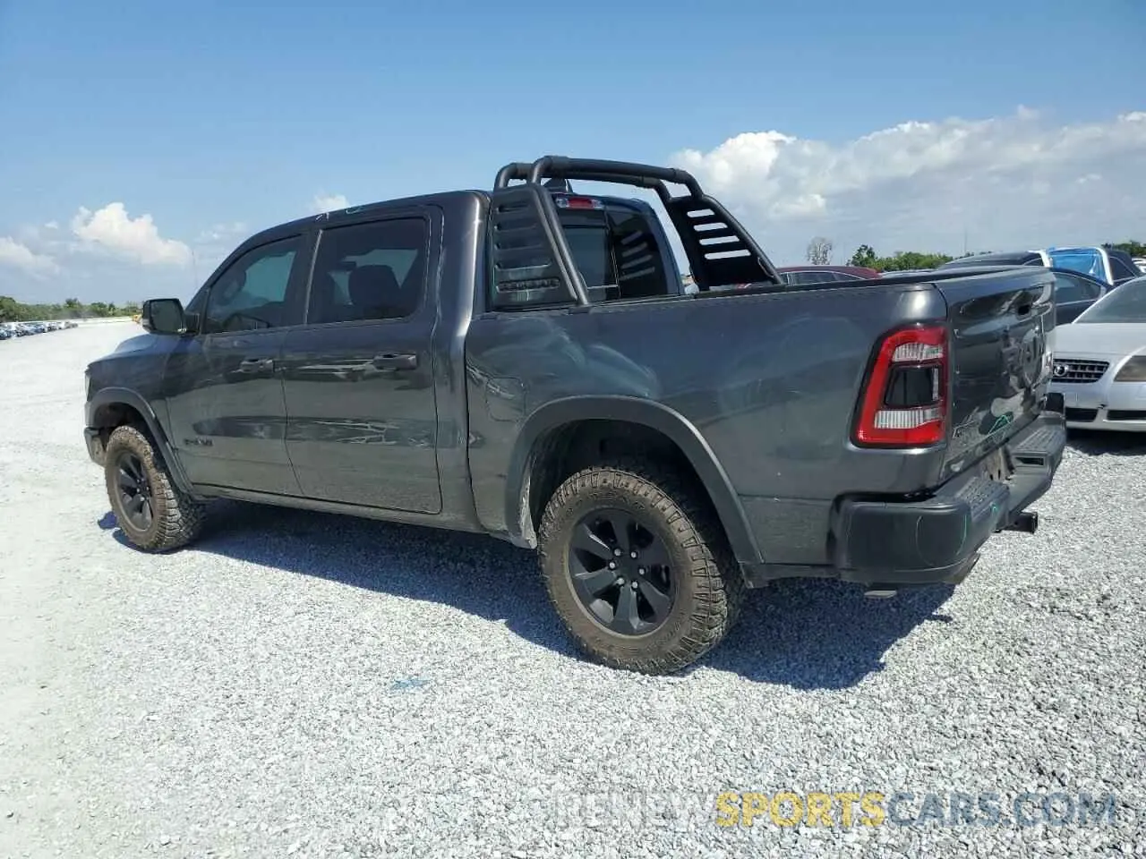 2 Photograph of a damaged car 1C6SRFLT1NN322669 RAM 1500 2022