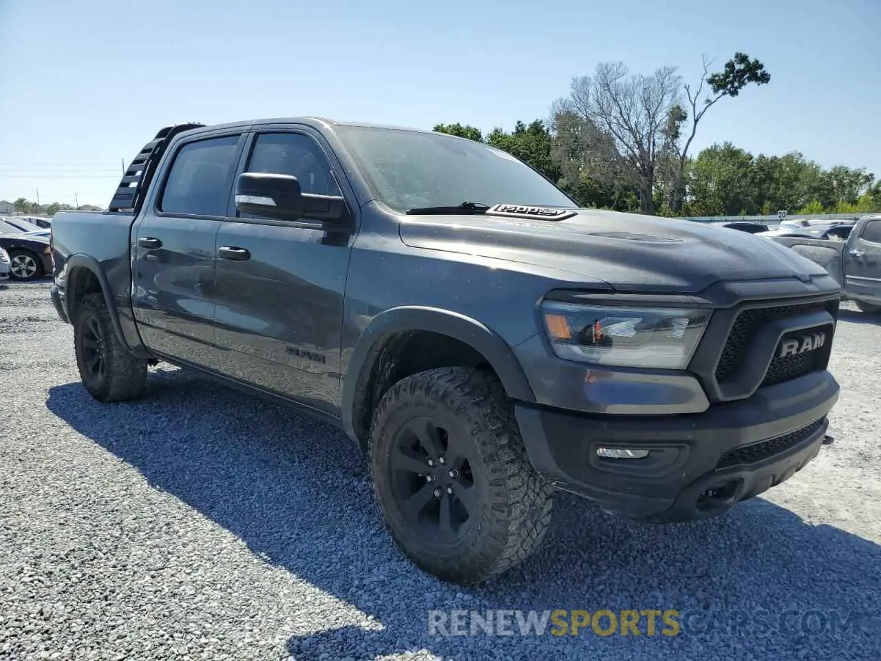 4 Photograph of a damaged car 1C6SRFLT1NN322669 RAM 1500 2022