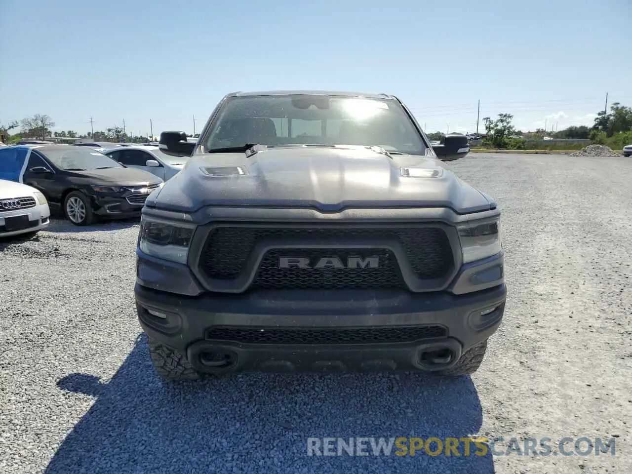 5 Photograph of a damaged car 1C6SRFLT1NN322669 RAM 1500 2022