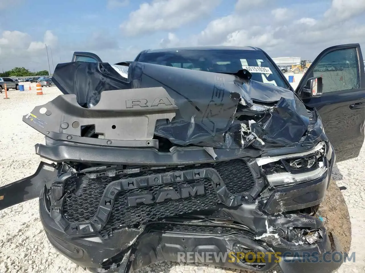 11 Photograph of a damaged car 1C6SRFLT3NN285589 RAM 1500 2022
