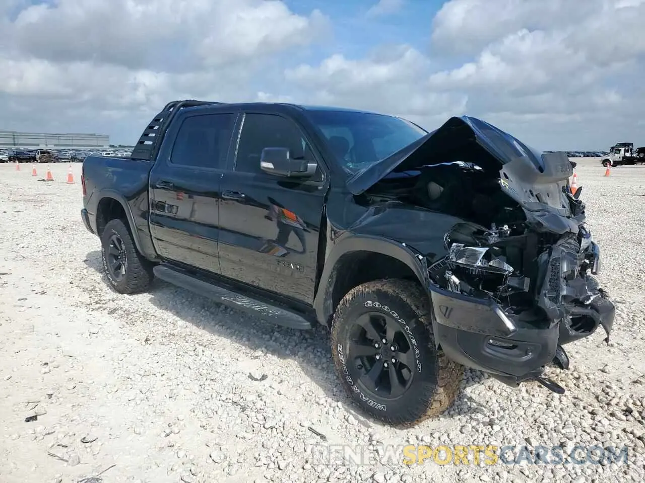 4 Photograph of a damaged car 1C6SRFLT3NN285589 RAM 1500 2022