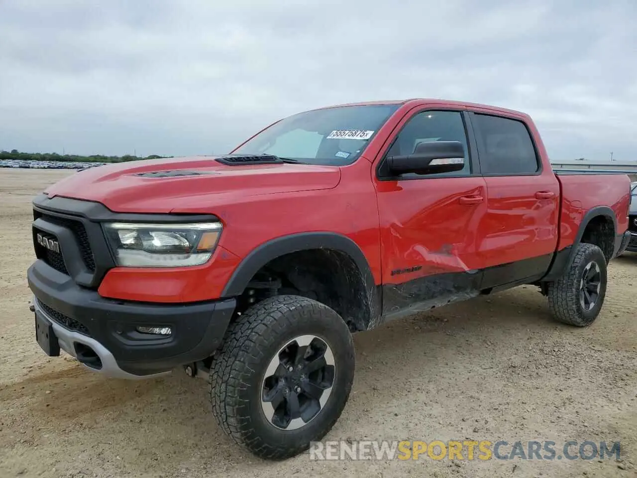1 Photograph of a damaged car 1C6SRFLTXNN204328 RAM 1500 2022