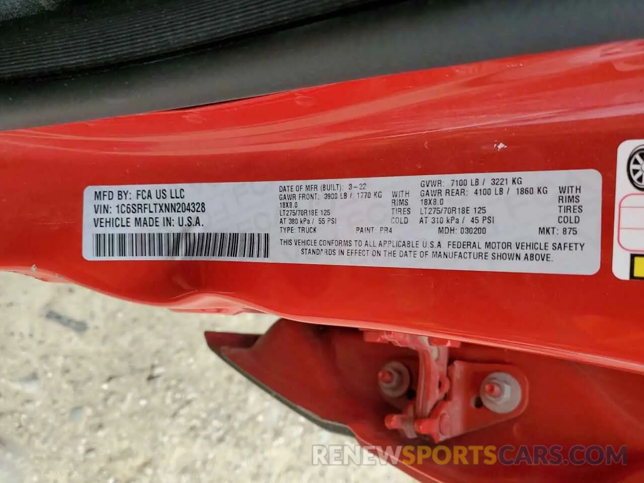 13 Photograph of a damaged car 1C6SRFLTXNN204328 RAM 1500 2022