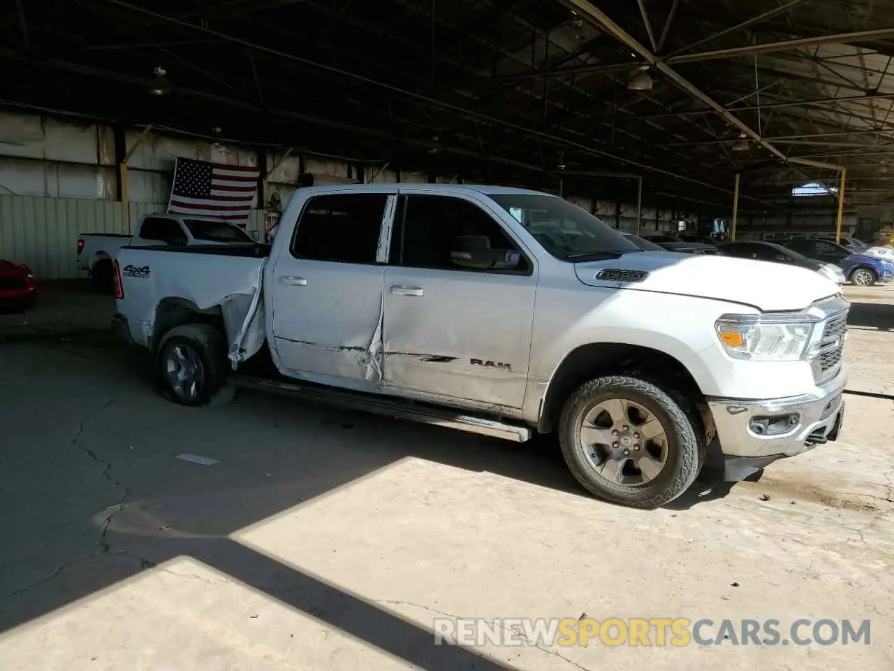 4 Photograph of a damaged car 1C6SRFMT1NN339227 RAM 1500 2022