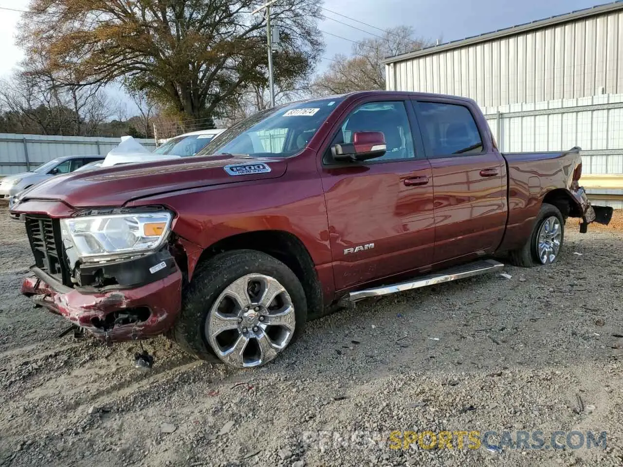 1 Photograph of a damaged car 1C6SRFMT3NN265986 RAM 1500 2022