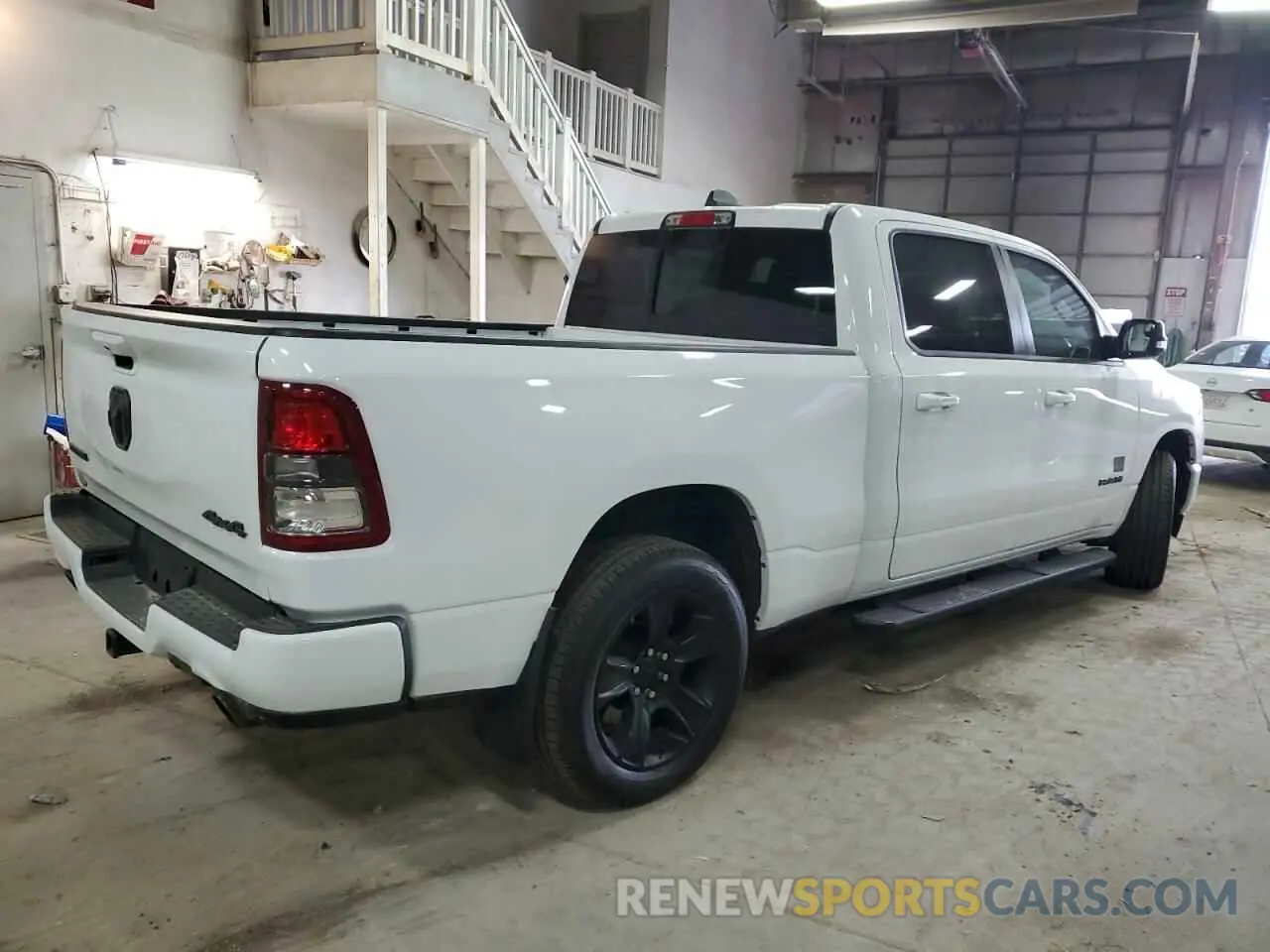 3 Photograph of a damaged car 1C6SRFMT3NN391071 RAM 1500 2022