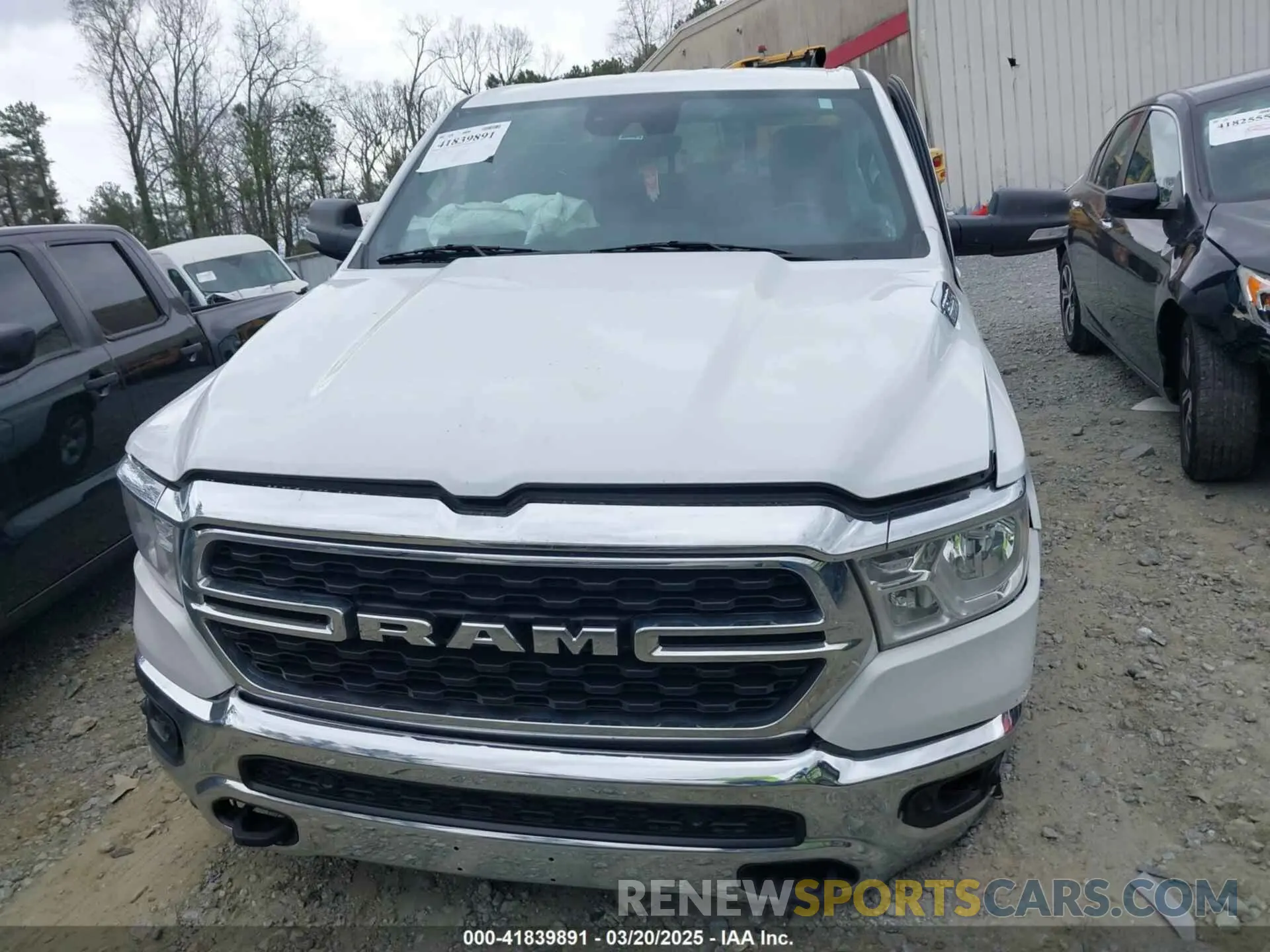 11 Photograph of a damaged car 1C6SRFMT3NN400075 RAM 1500 2022