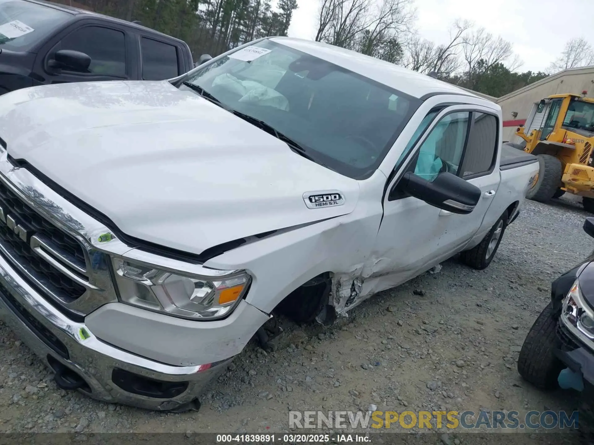 13 Photograph of a damaged car 1C6SRFMT3NN400075 RAM 1500 2022
