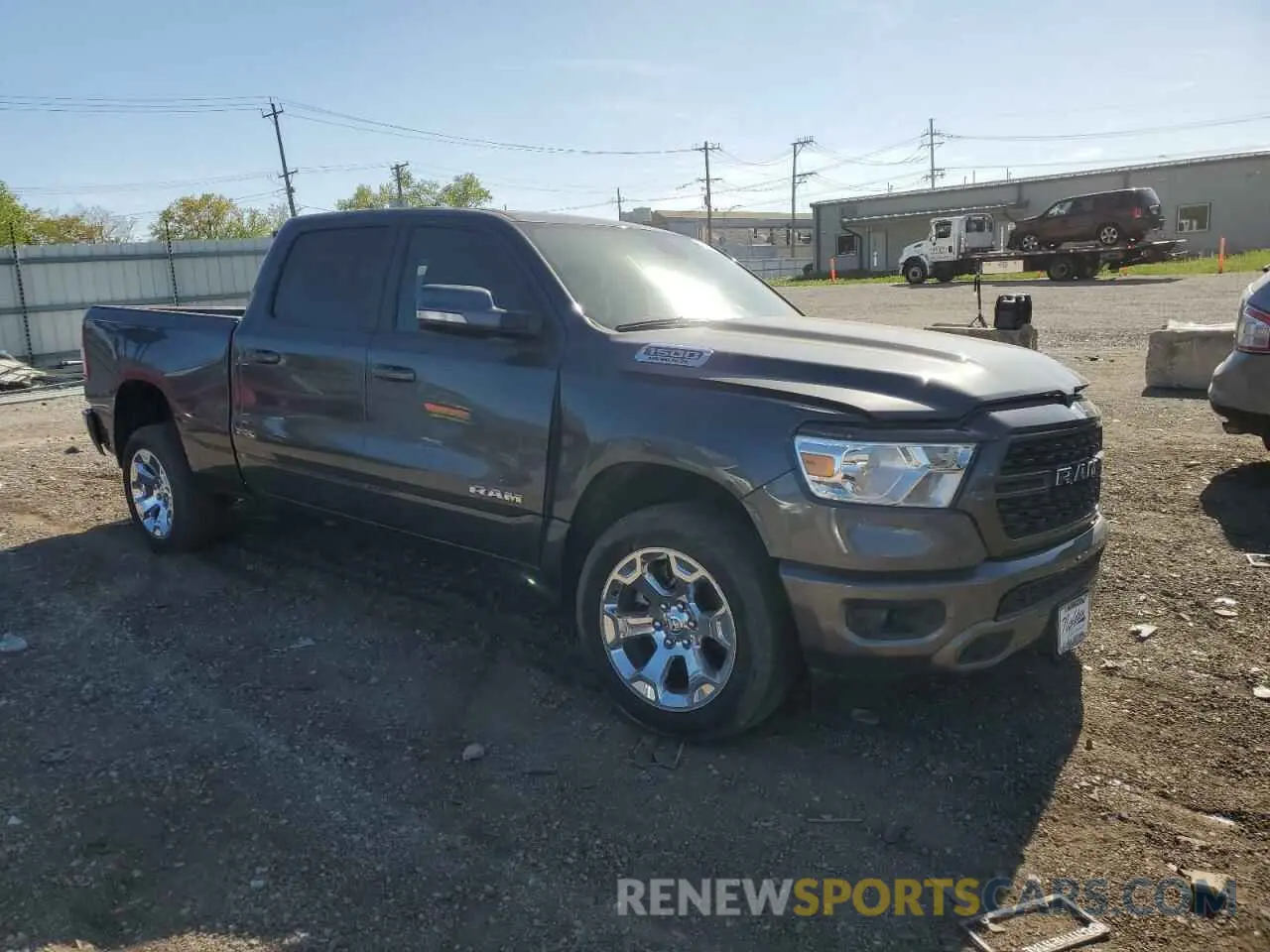 4 Photograph of a damaged car 1C6SRFMT6NN256750 RAM 1500 2022