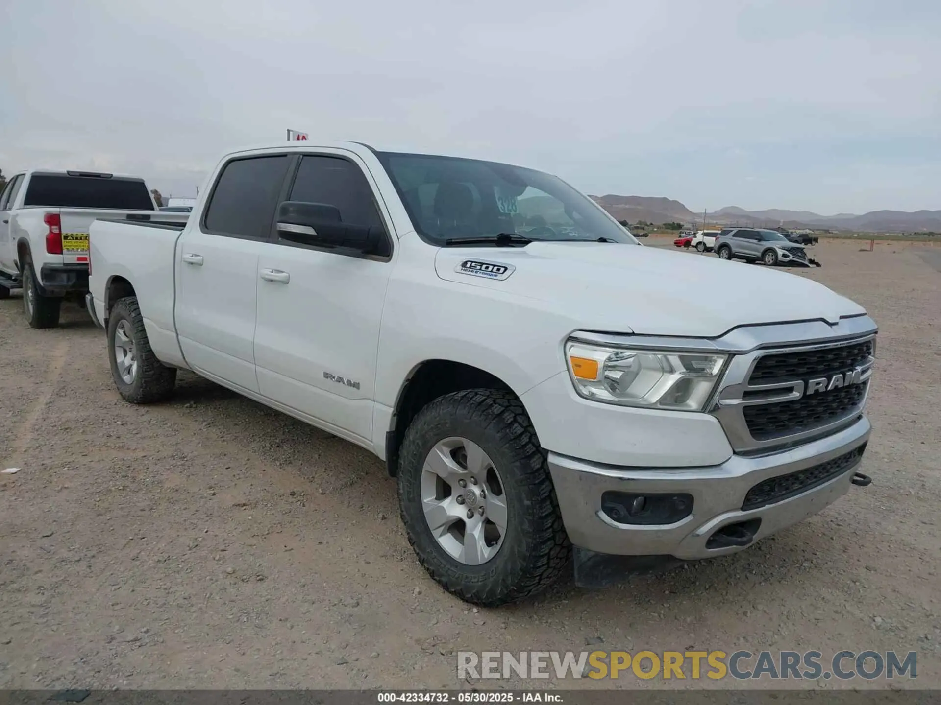 1 Photograph of a damaged car 1C6SRFMT8NN313403 RAM 1500 2022