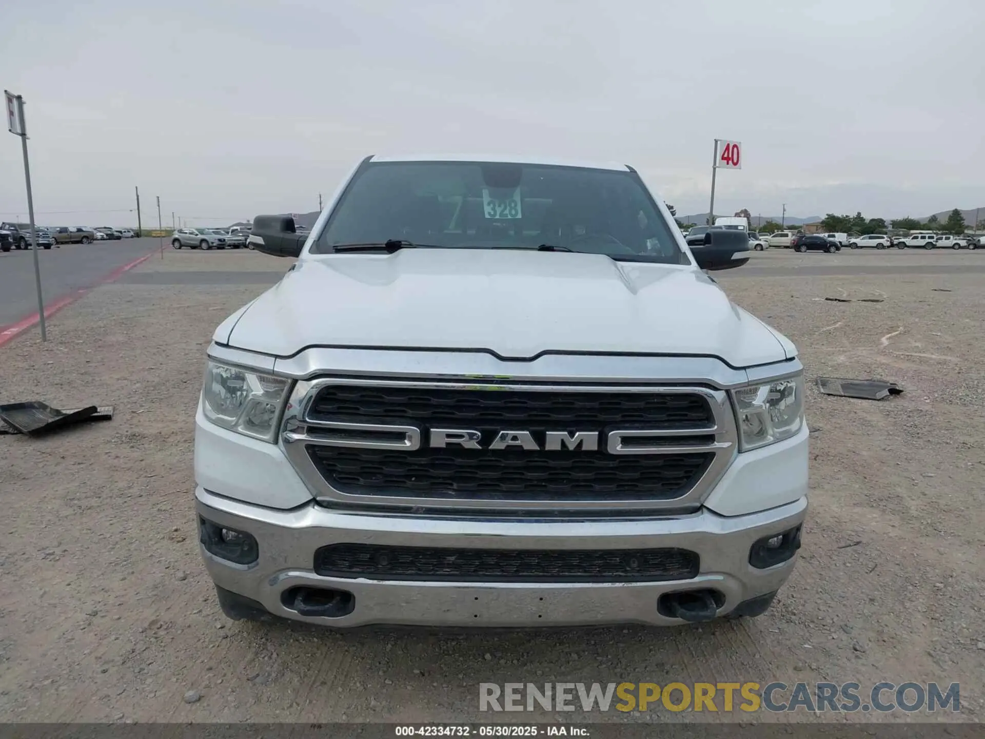 12 Photograph of a damaged car 1C6SRFMT8NN313403 RAM 1500 2022