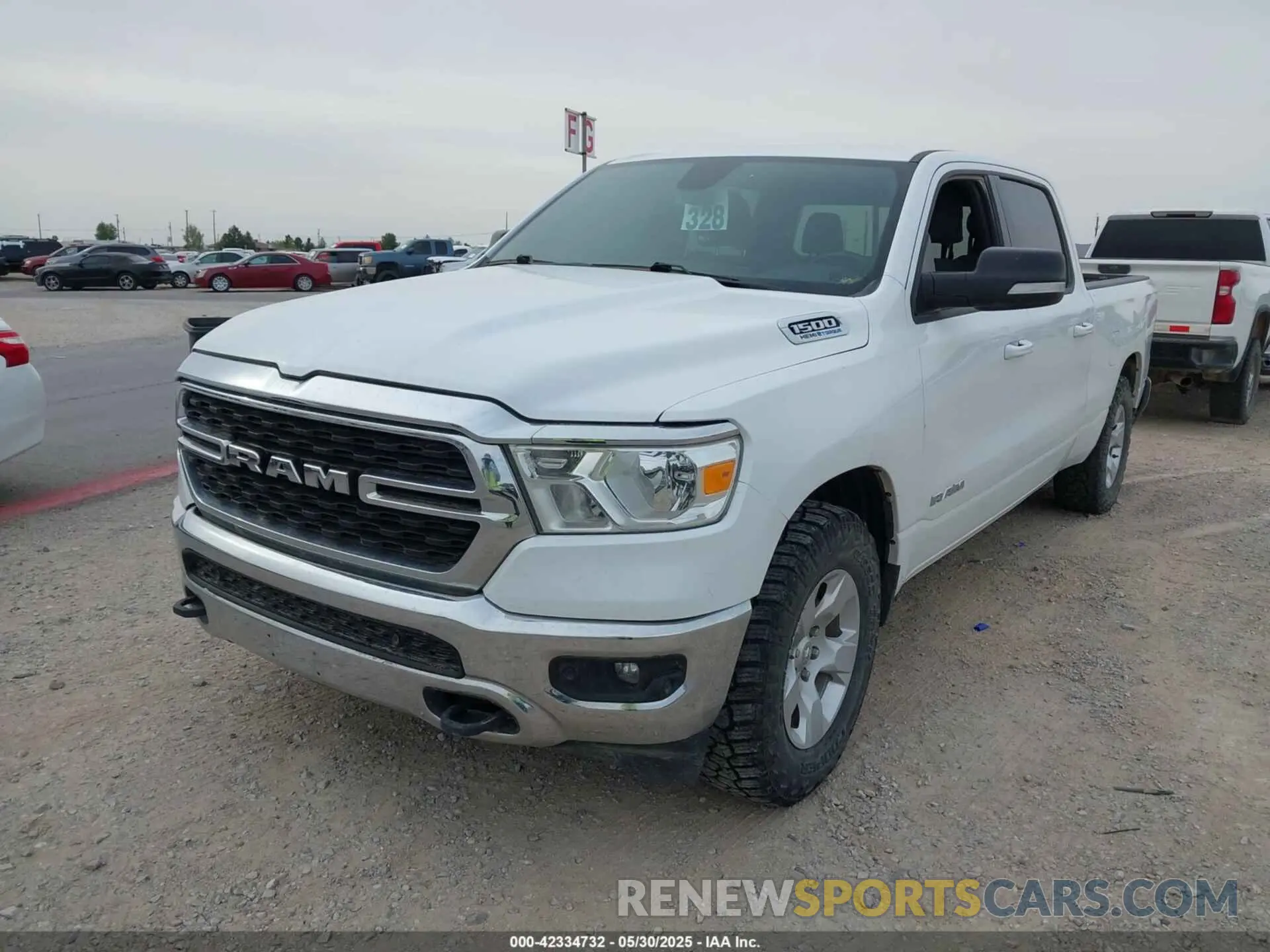 2 Photograph of a damaged car 1C6SRFMT8NN313403 RAM 1500 2022