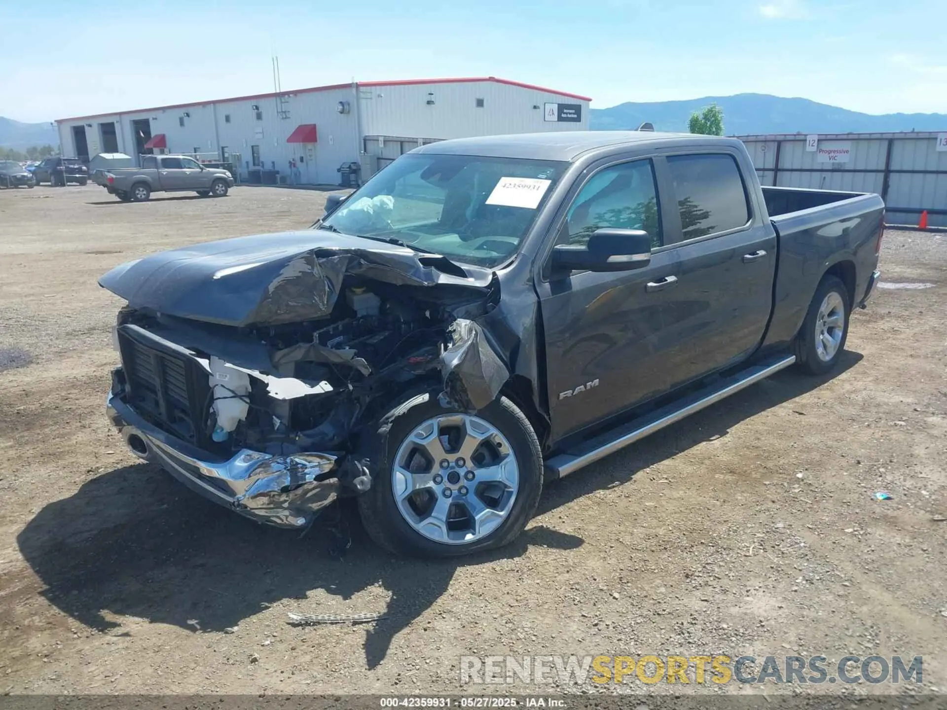 2 Photograph of a damaged car 1C6SRFMT8NN481607 RAM 1500 2022