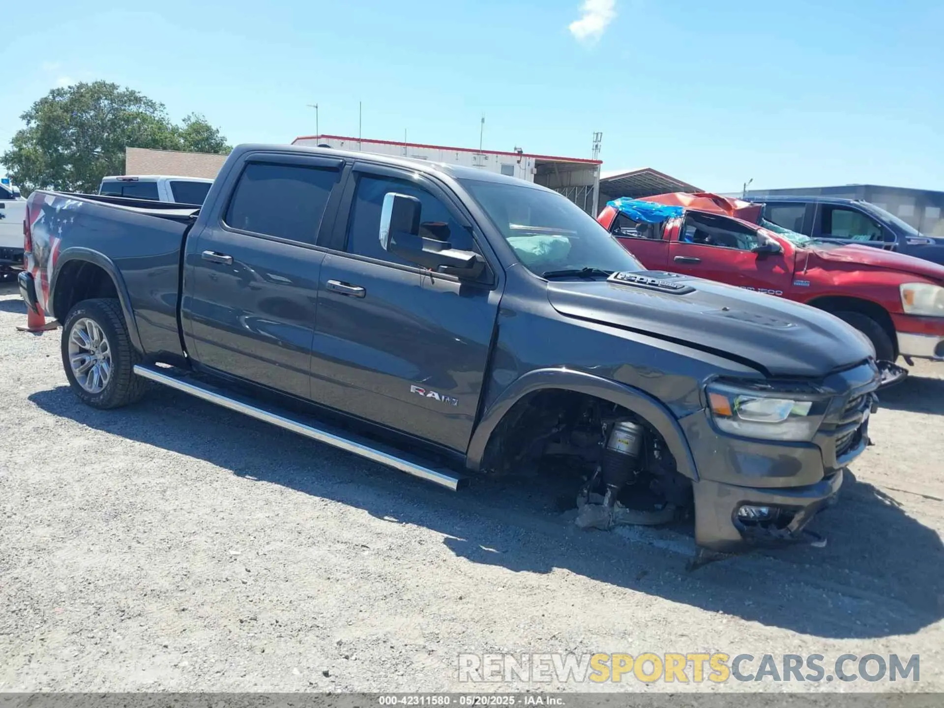 1 Photograph of a damaged car 1C6SRFRM6NN217271 RAM 1500 2022