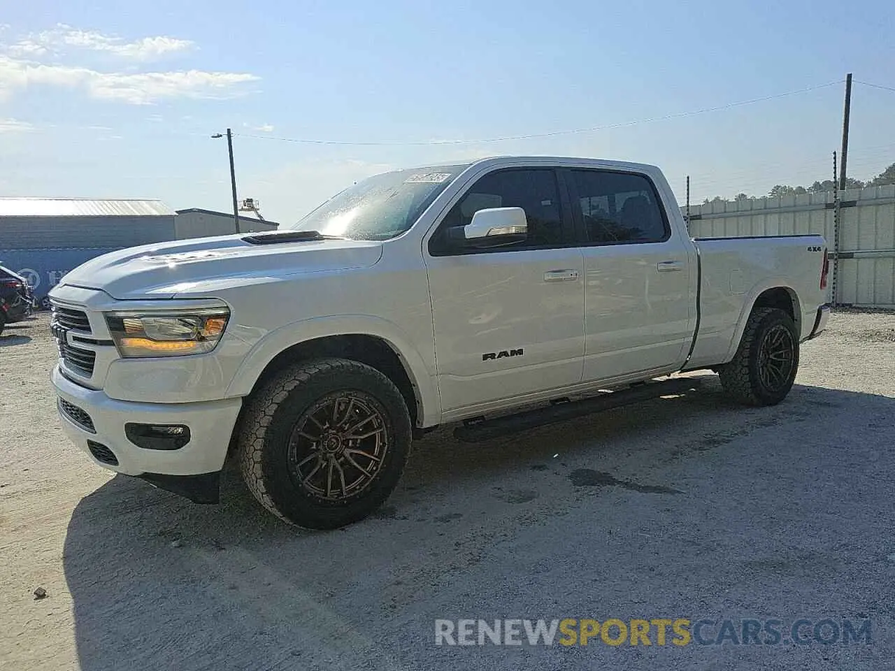 1 Photograph of a damaged car 1C6SRFRT6NN167351 RAM 1500 2022
