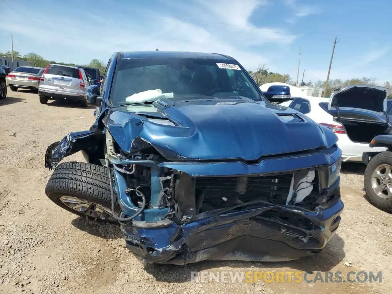 5 Photograph of a damaged car 1C6SRFRTXNN141884 RAM 1500 2022