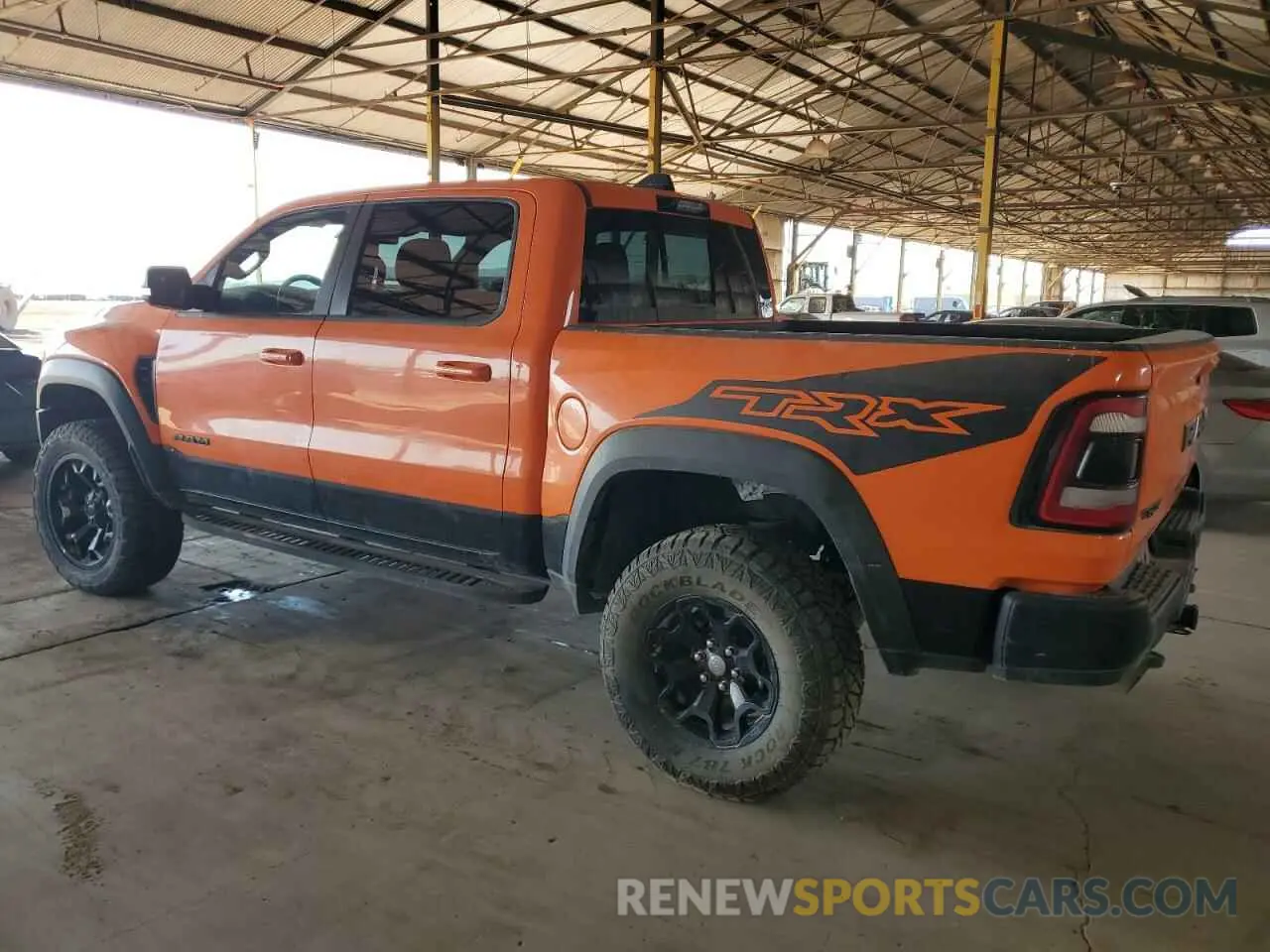 2 Photograph of a damaged car 1C6SRFU91NN149285 RAM 1500 2022