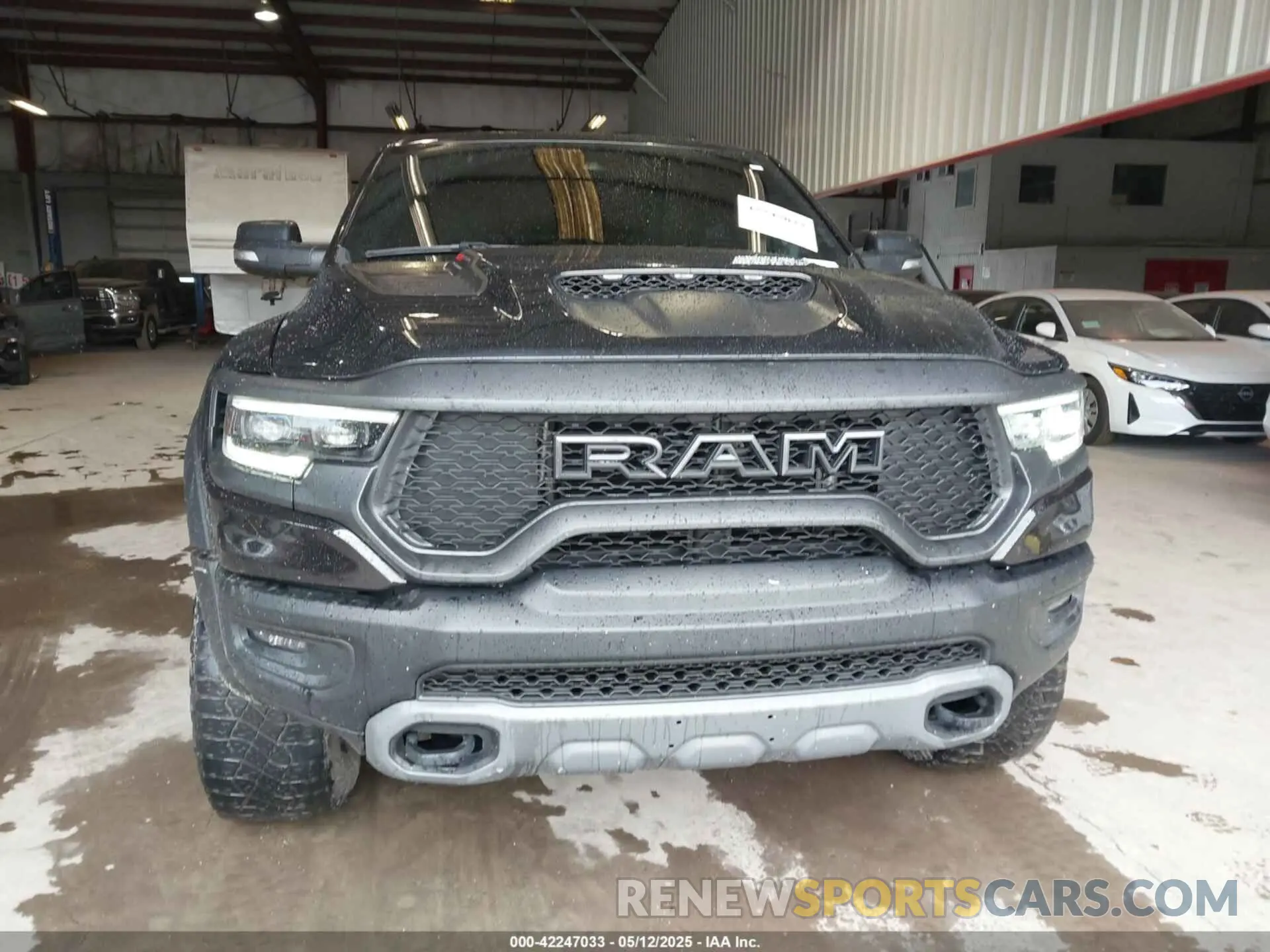 12 Photograph of a damaged car 1C6SRFU91NN319239 RAM 1500 2022