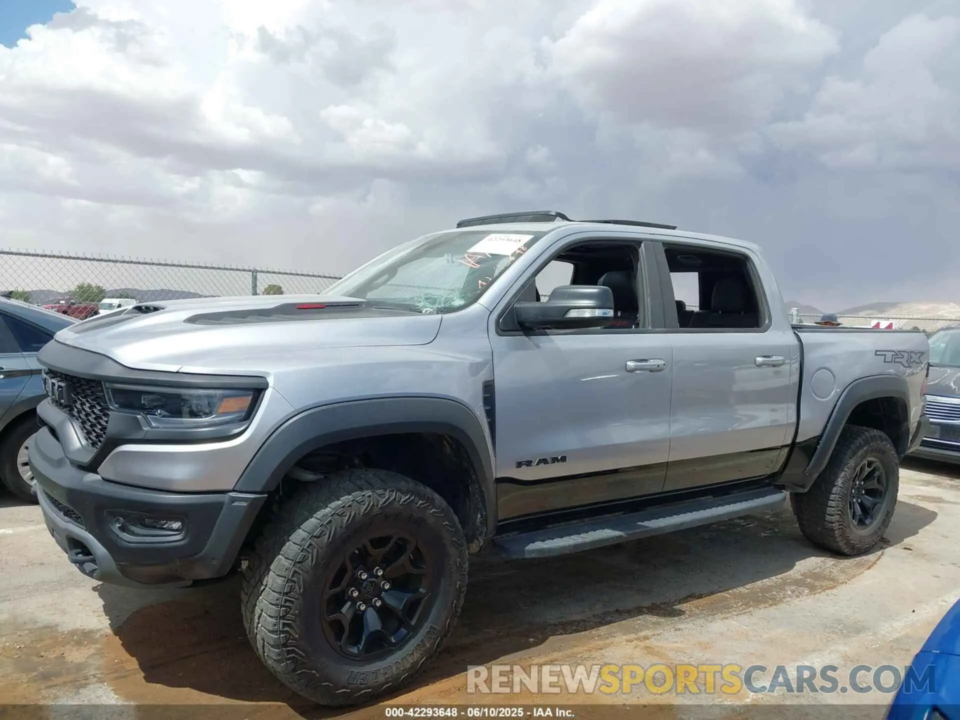 13 Photograph of a damaged car 1C6SRFU91NN370644 RAM 1500 2022