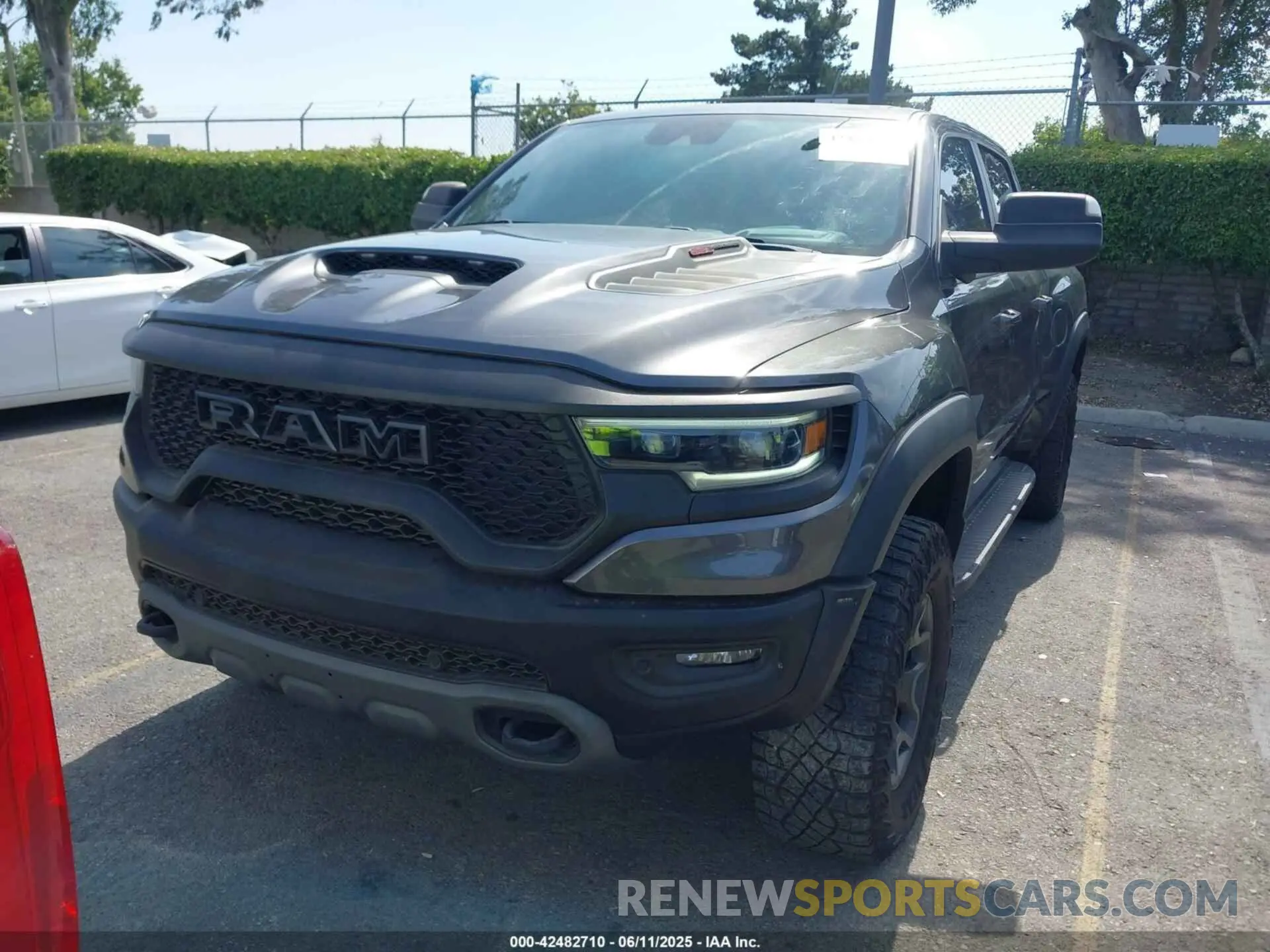 12 Photograph of a damaged car 1C6SRFU91NN392885 RAM 1500 2022
