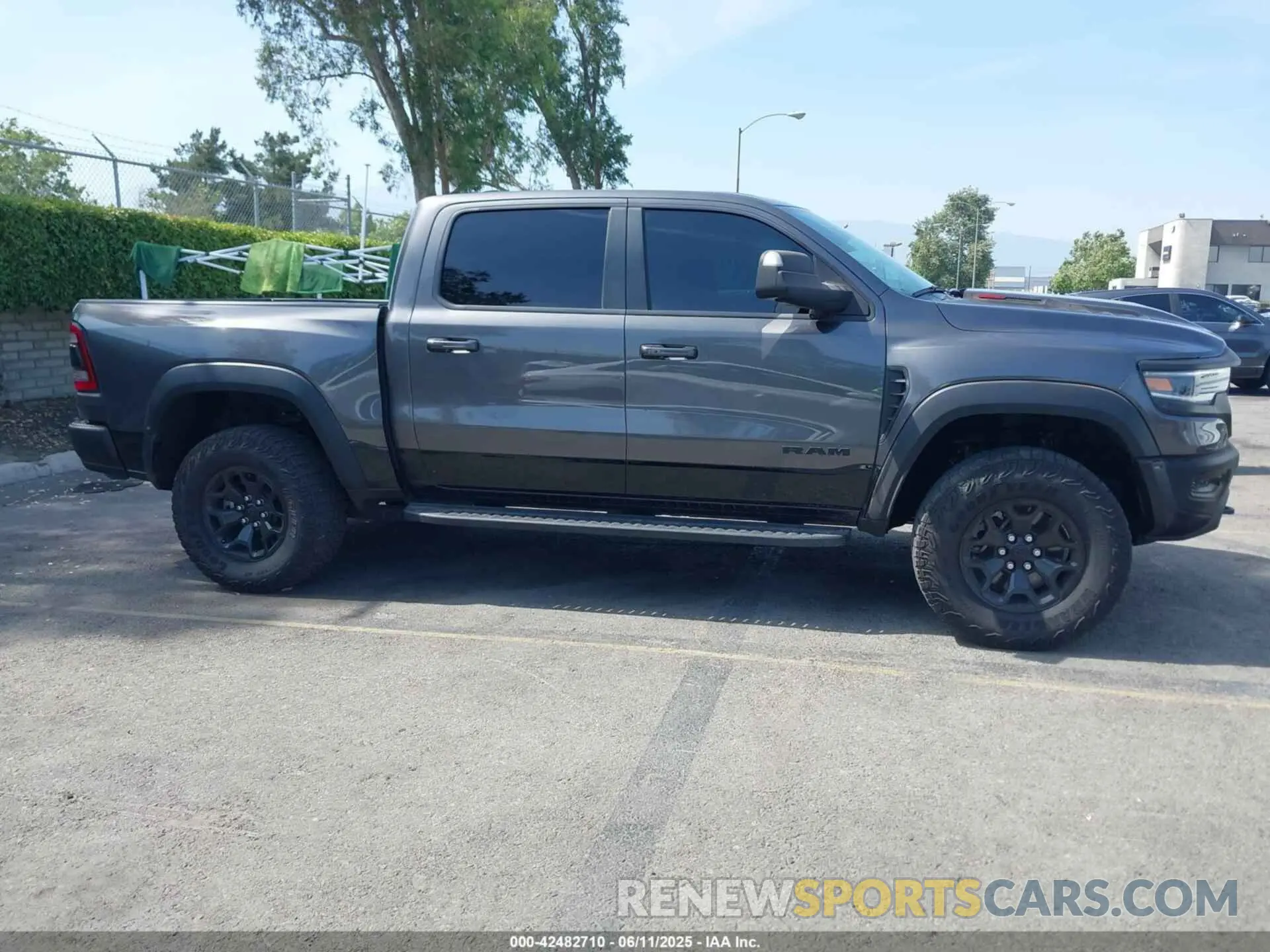 13 Photograph of a damaged car 1C6SRFU91NN392885 RAM 1500 2022