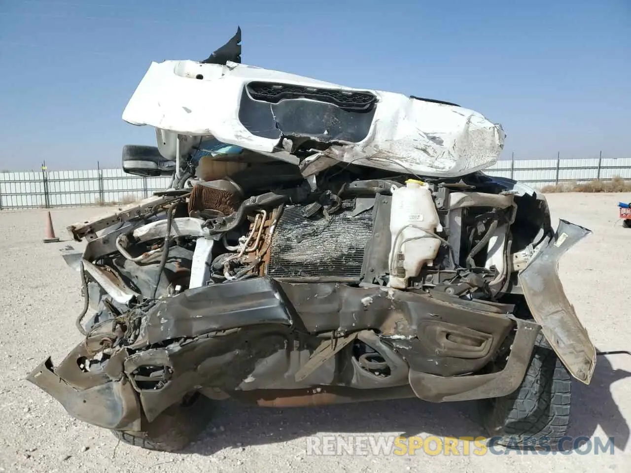 12 Photograph of a damaged car 1C6SRFU92NN270357 RAM 1500 2022